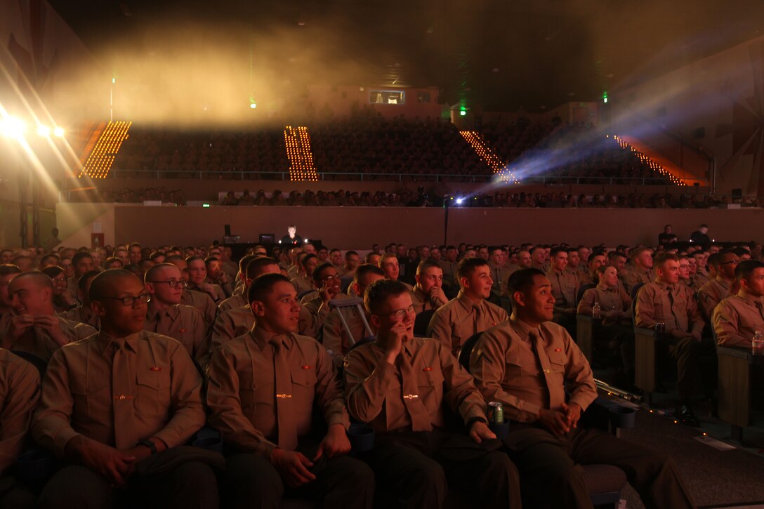Marines aboard the Combat Center take a break from their duties to listen to a few comedians during the Leatherneck Comedy and Entertainment Tour 2013, Feb. 1. Alex Scott and Colin Kane both wanted to share a few laughs with the crowd before they moved on to their next venue. 