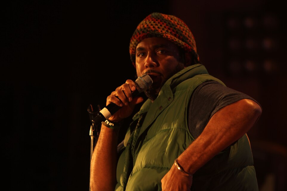 Comedian Alex Scott takes the stage during the 2013 Leatherneck Comedy and Entertainment Tour Feb. 1, at the Combat Center's Sunset Cinema. 