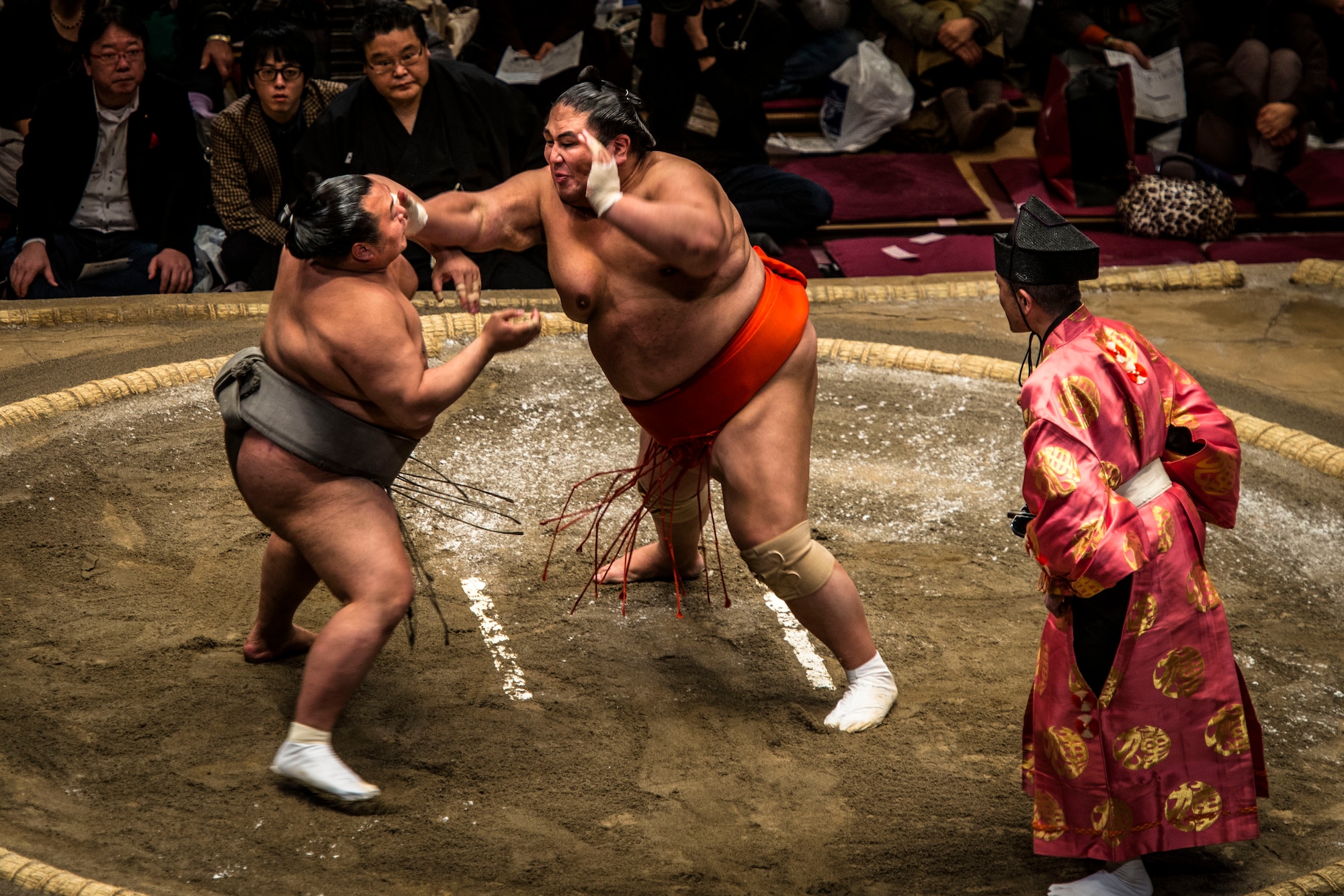 YOKOTA AIR BASE,Japan -- A Sumo wrestler strikes his opponent during the Grand Sumo Tournament at the Ryogoku Kokugikan Sumo Hall in Tokyo, Feb. 10, 2013. Being stationed at Yokota Air Base offers Airmen the chance to engage with the Japanese community and enjoy Japanese culture. (U.S. Air Force photo by Capt. Raymond Geoffroy)