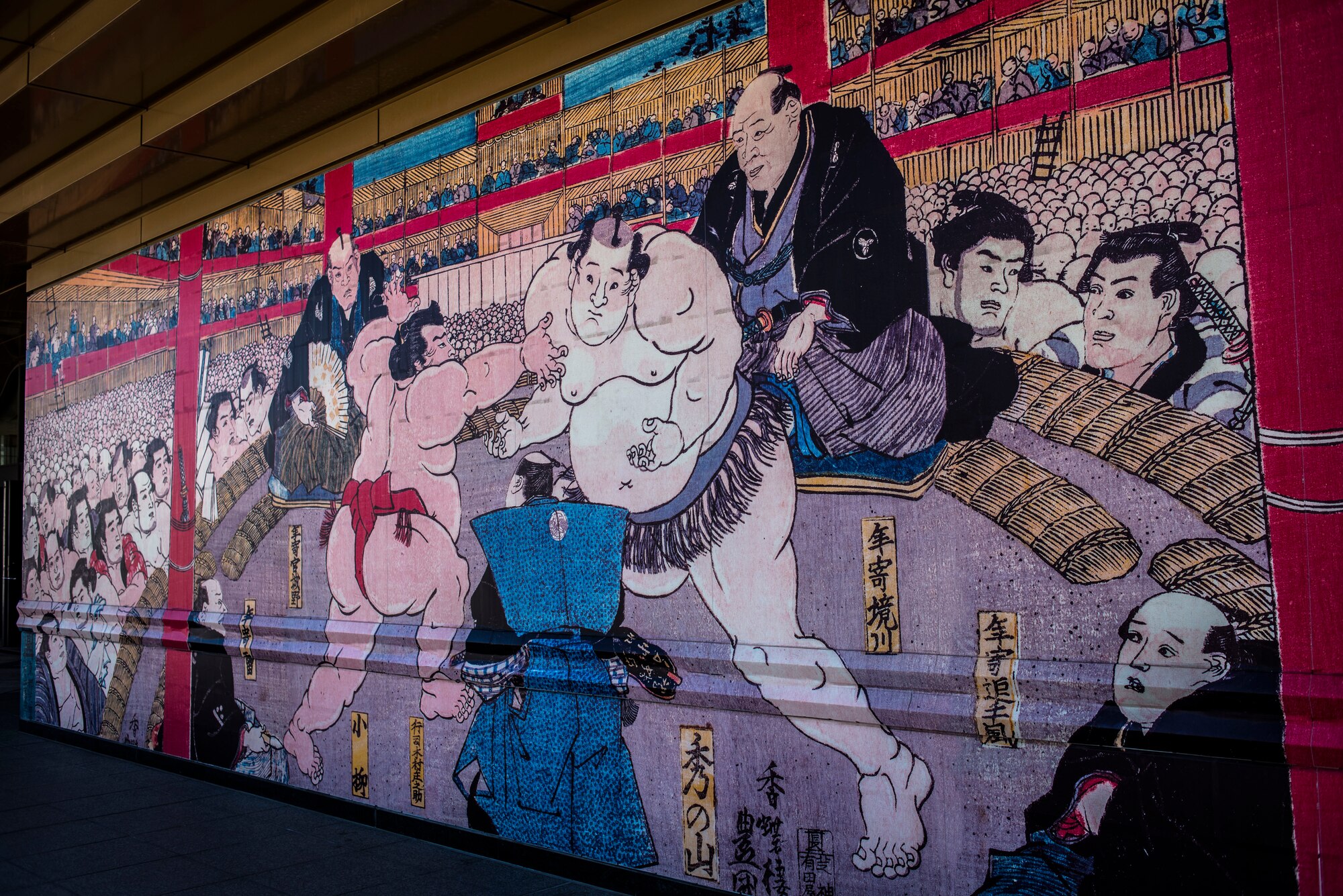 YOKOTA AIR BASE,Japan-- A Sumo mural adorns the outer wall of the Ryogoku Kokugikan Sumo Hall in Tokyo, Feb. 10, 2013. Thanks to Yokota Air Base’s Information, Tickets and Travel office, Yokota Airmen had the unique opportunity to experience Sumo first-hand. (U.S. Air Force photo by Capt. Raymond Geoffroy)