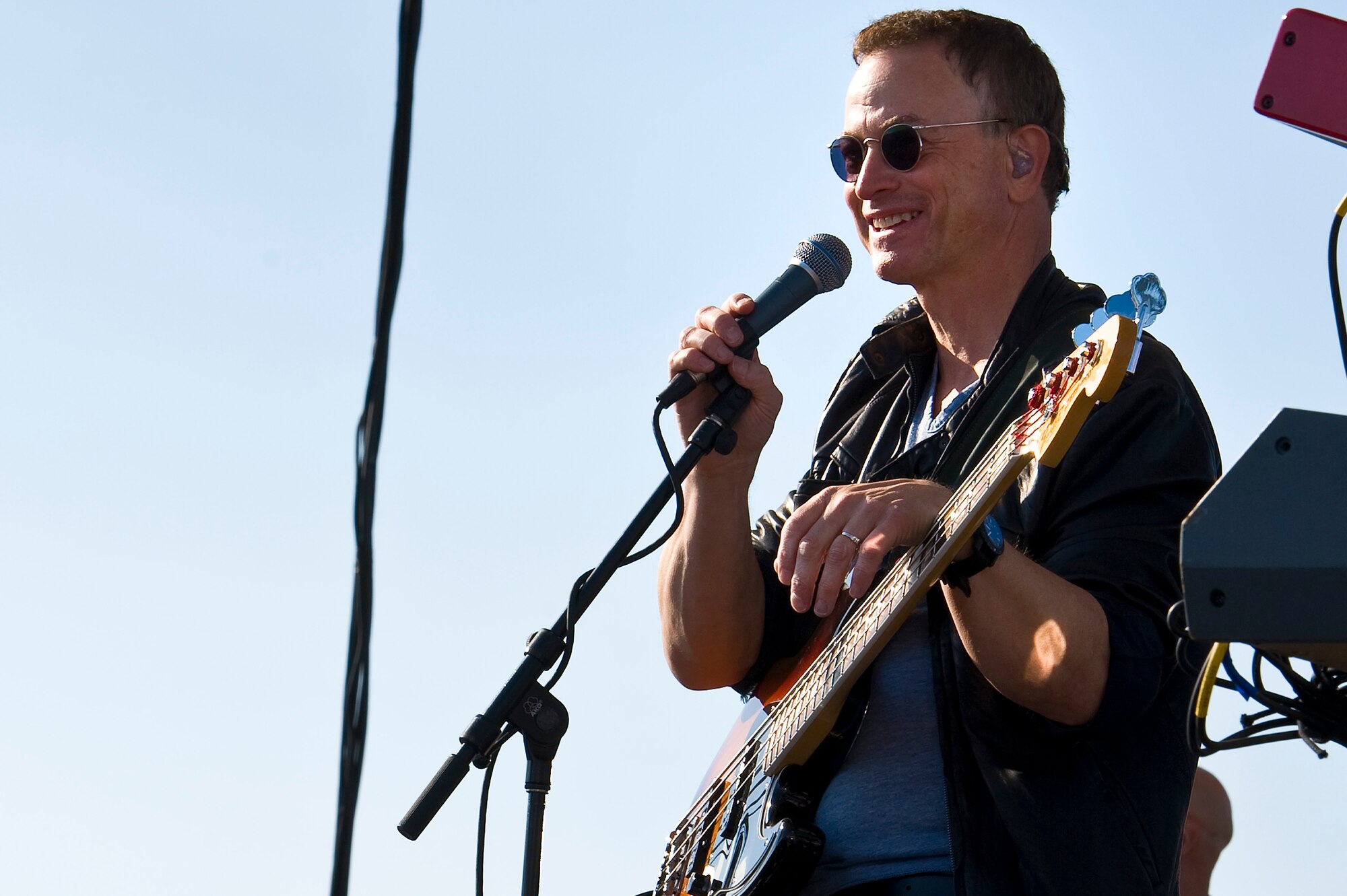 Gary Sinise and the Lt. Dan Band perform a concert for Hurlburt airmen,family and guests on the flight line on Hurlburt Field, Fla., Feb. 9, 2013.Over 3,000 people attended the free event which was sponsored by HurlburtField Force Support Squadron and the Gary Sinise Foundation.  (U.S. Air Force Photo/ Airman First Class Michelle Vickers)