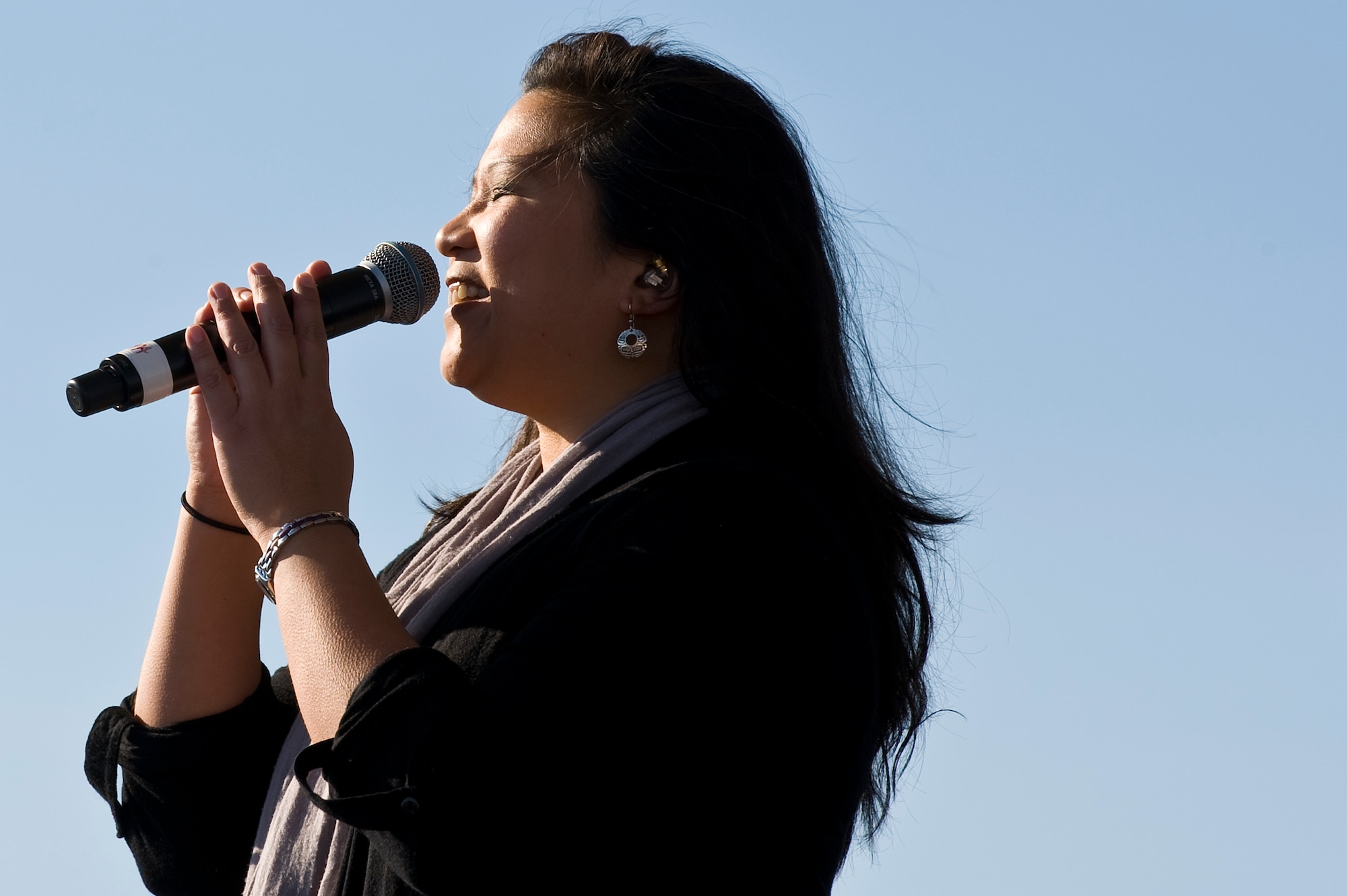 Gary Sinise and the Lt. Dan Band perform a concert for Hurlburt airmen,family and guests on the flight line on Hurlburt Field, Fla., Feb. 9, 2013.Over 3,000 people attended the free event which was sponsored by HurlburtField Force Support Squadron and the Gary Sinise Foundation.  (U.S. Air Force Photo/ Airman First Class Michelle Vickers)