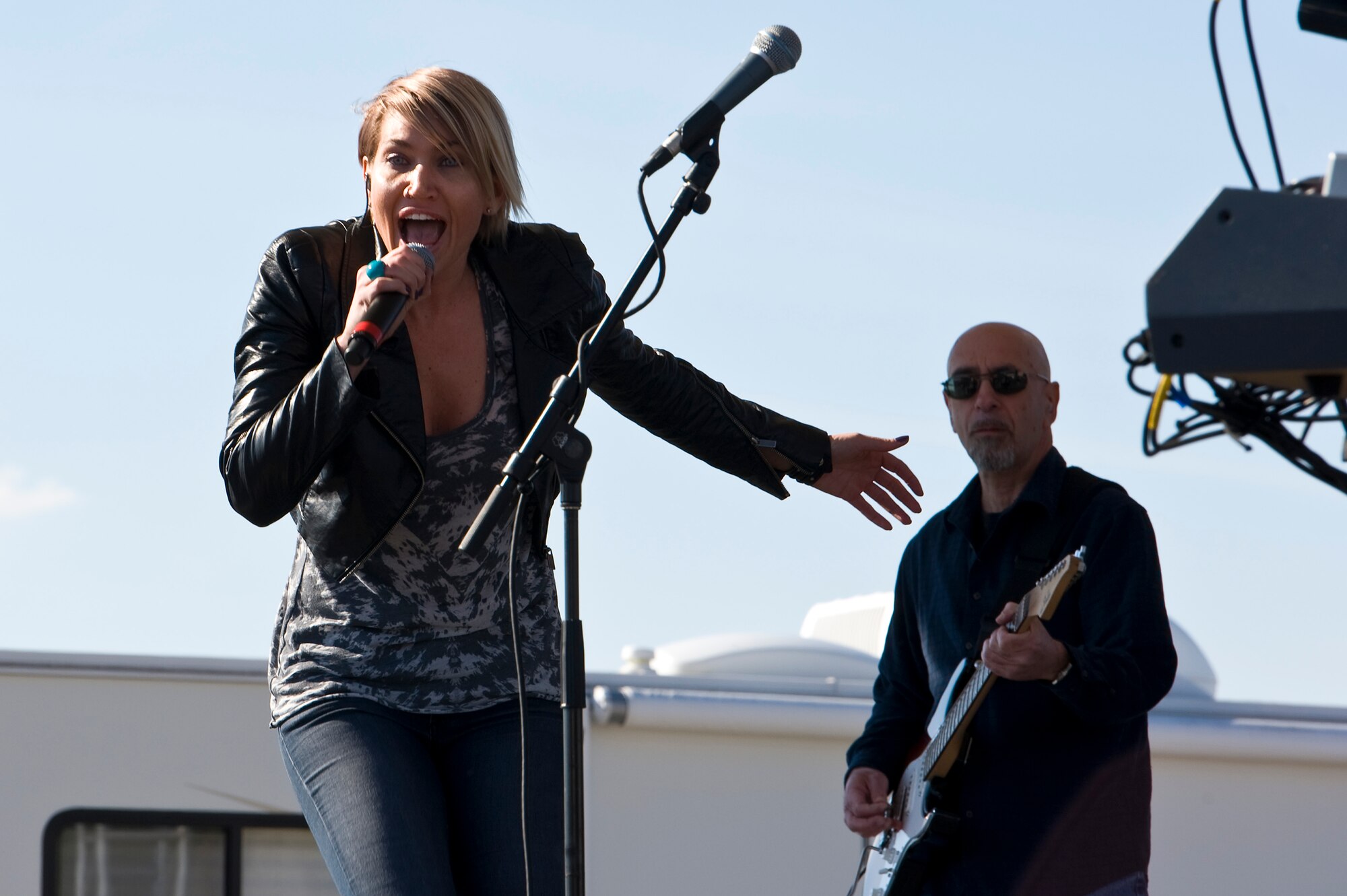 Gary Sinise and the Lt. Dan Band perform a concert for Hurlburt airmen,family and guests on the flight line on Hurlburt Field, Fla., Feb. 9, 2013.Over 3,000 people attended the free event which was sponsored by HurlburtField Force Support Squadron and the Gary Sinise Foundation.  (U.S. Air Force Photo/ Airman First Class Michelle Vickers)