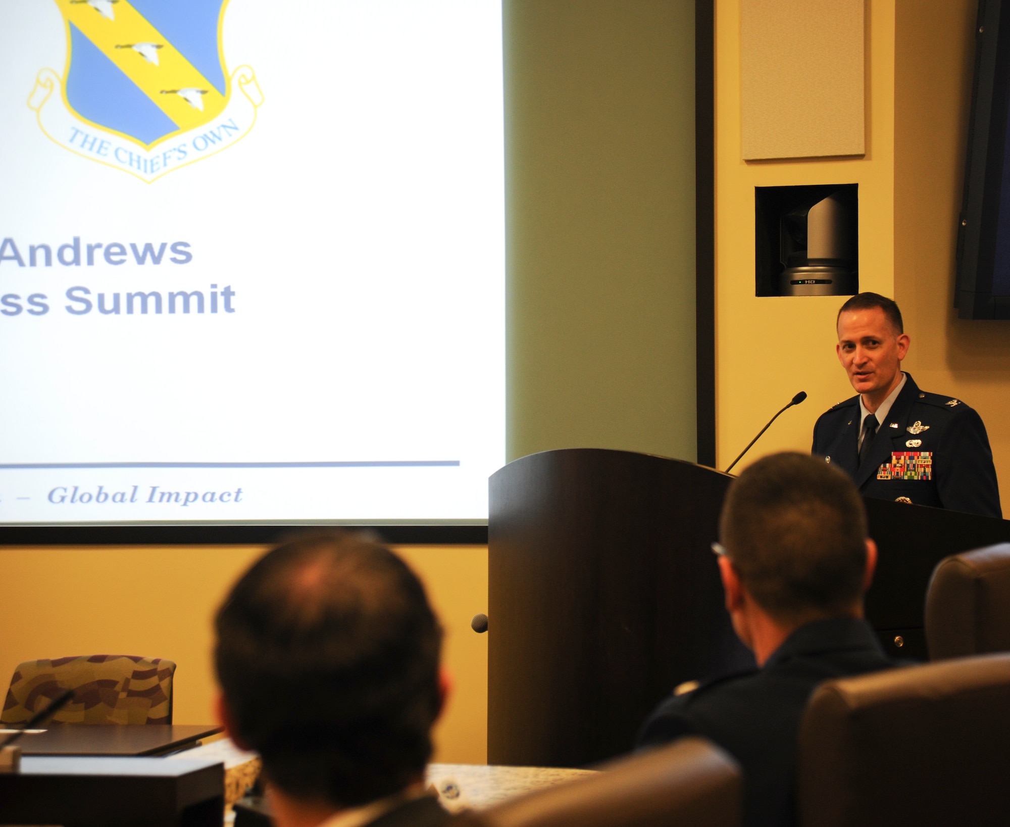 Col. Bill Knight, 11th Wing/Joint Base Andrews commander, hosts business Summit 2013, at the Jacob E. Smart building here, Feb. 5. The summit provides the community with an opportunity for contractor/vendor outreach and networking with contracting officials from both the Air Force District of Washington and the 11th Wing Contracting Squadron. (U.S. Air Force photo/ Staff Sgt. Amber Russell)