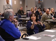 Texas State Sen. Leticia Van de Putte discusses development and encroachment issues with military members from Joint Base San Antonio-Camp Bullis Feb. 8. Members of the Texas state legislator took part in a immersion tour that included mount towns, simulated medical evacuations and live fire demonstrations at Camp Bullis. (U.S. Air Force photo by Benjamin Faske) (released)
