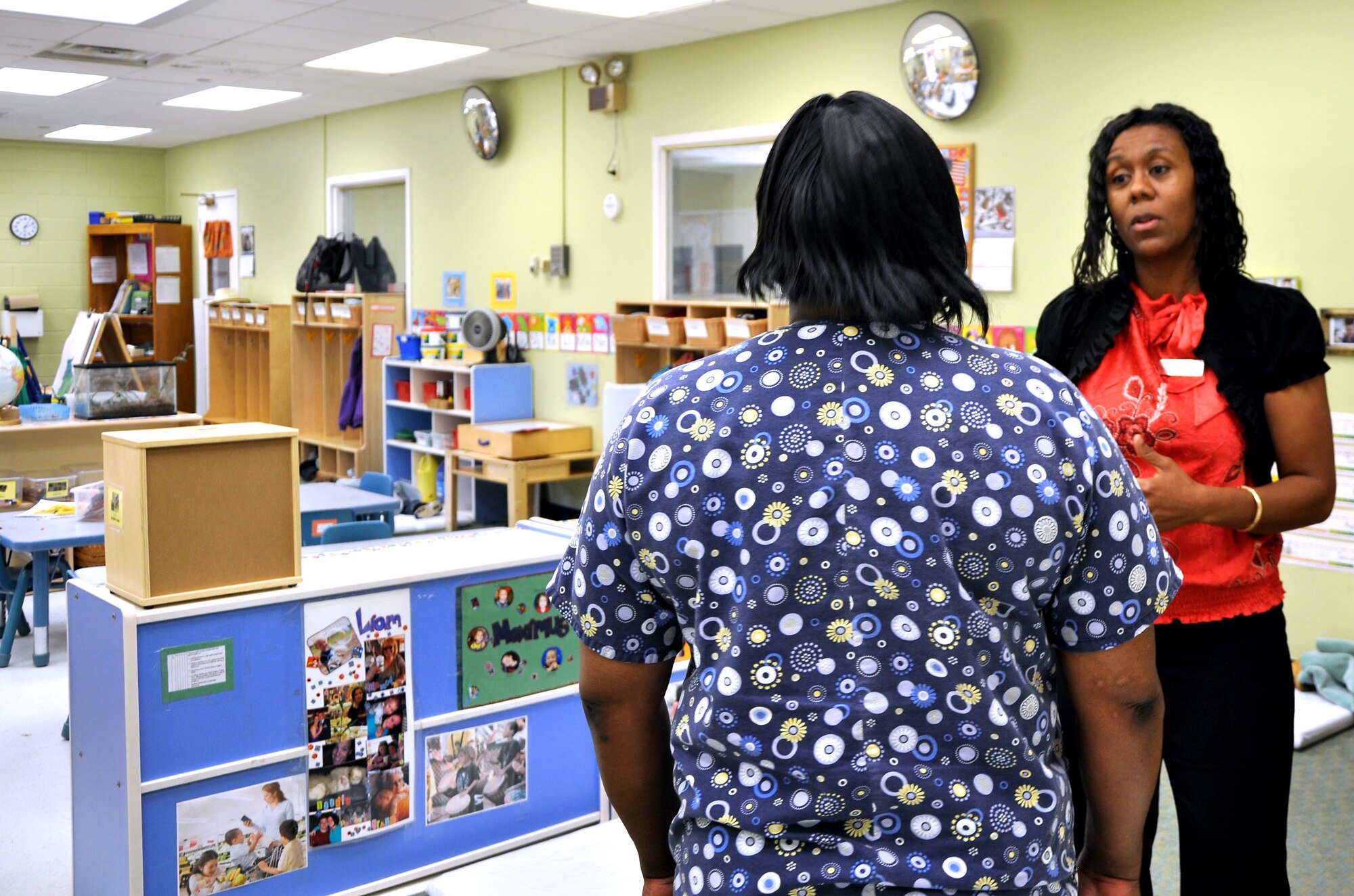 GOODFELLOW AIR FORCE BASE, Texas-- Angela Green, Child Development Center assistant director, talks to a member of her staff Feb. 7 at the CDC here. Green has focused on feedback from her staff as she transitions into her new position. (U.S. Air Force photo/ Airman Jessica Keith) 