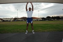 Squat Jump:
Stand as tall as you can. Then dip your knees and squat down, swinging your arms back, in preparation to leap.  Jump as high as you can, when you land immediately squat down and jump again.  (U.S. Air Force photo by Don Lindsey)
