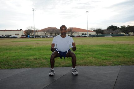 Squat Jump:
Stand as tall as you can. Then dip your knees and squat down, swinging your arms back, in preparation to leap.  Jump as high as you can, when you land immediately squat down and jump again.  (U.S. Air Force photo by Don Lindsey)
