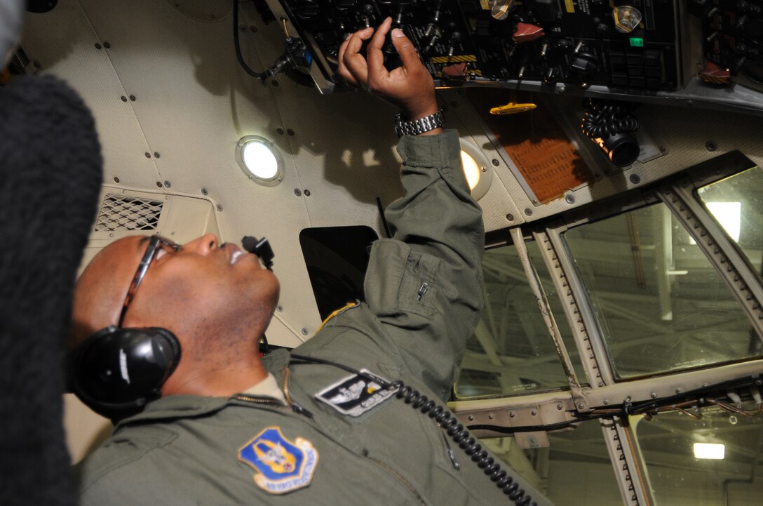 Senior Master Sgt. Charles Walker performs a dash one preflight inspection on a C-130H Hercules aircraft here, Feb. 3, 2013. SMSgt Walker is a Flight Engineer for the 773rd Airlift Squadron, Youngstown Air Reserve Station, Ohio. U.S. Air Force photo by Technical Sgt. James Brock