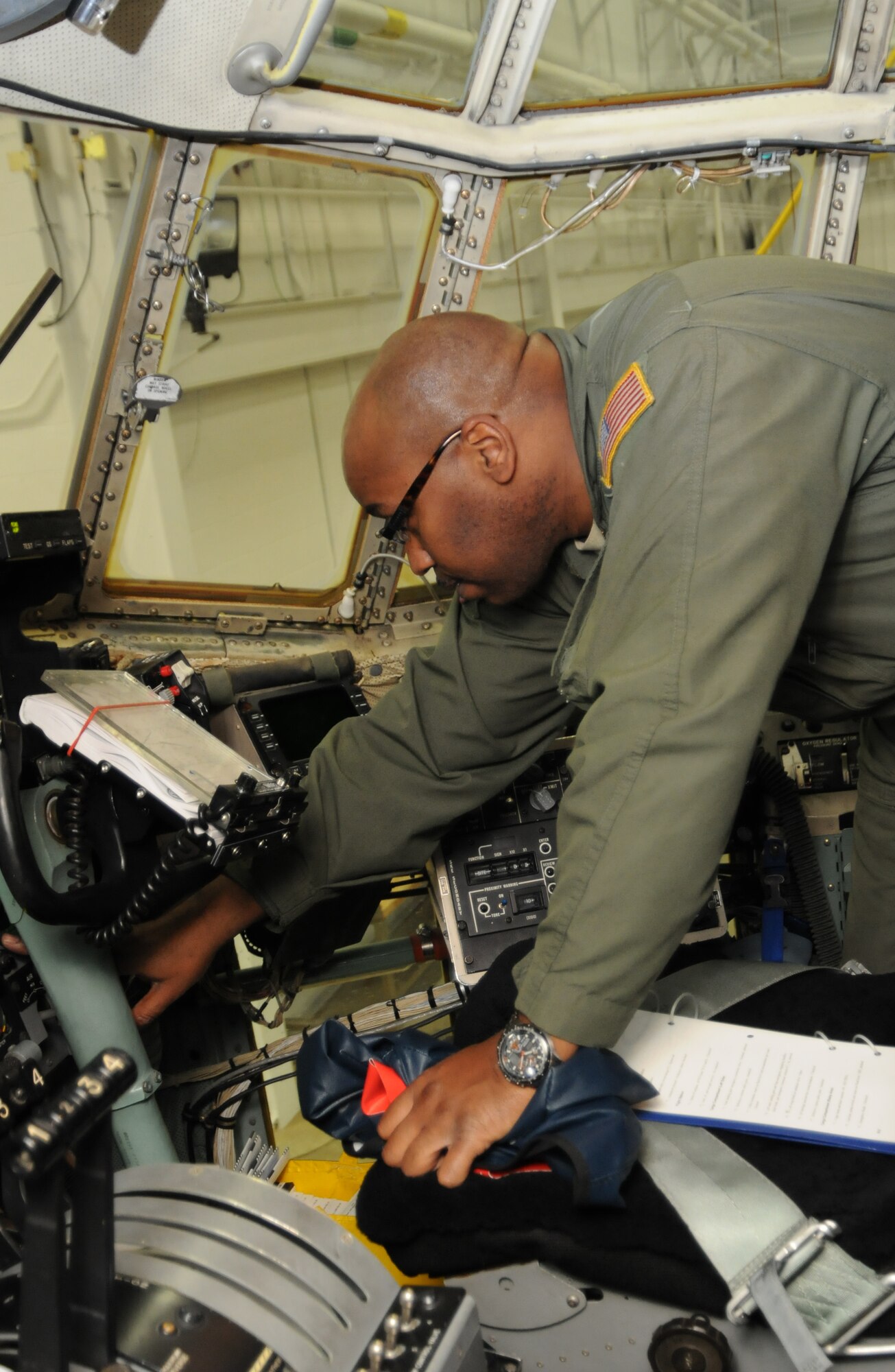 Senior Master Sgt. Charles Walker performs a dash one preflight inspection on Feb. 3, 2013. SMSgt Walker is a Flight Engineer for the 773rd Airlift Squadron, Youngstown Air Reserve Station, Ohio. U.S. Air Force photo by Technical Sgt. James Brock