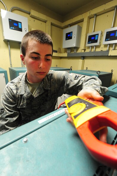 WHITEMAN AIR FORCE BASE, Mo. -- Airman 1st Class Devin Laird, 509th Civil Engineer Squadron electrical systems apprentice, uses a multimeter to test the voltage of a constant current regulator, Jan. 29. The constant current regulators supply electricity to systems that power airfield lighting fixtures. (U.S. Air Force photo/Staff Sgt. Nick Wilson) (Released)
