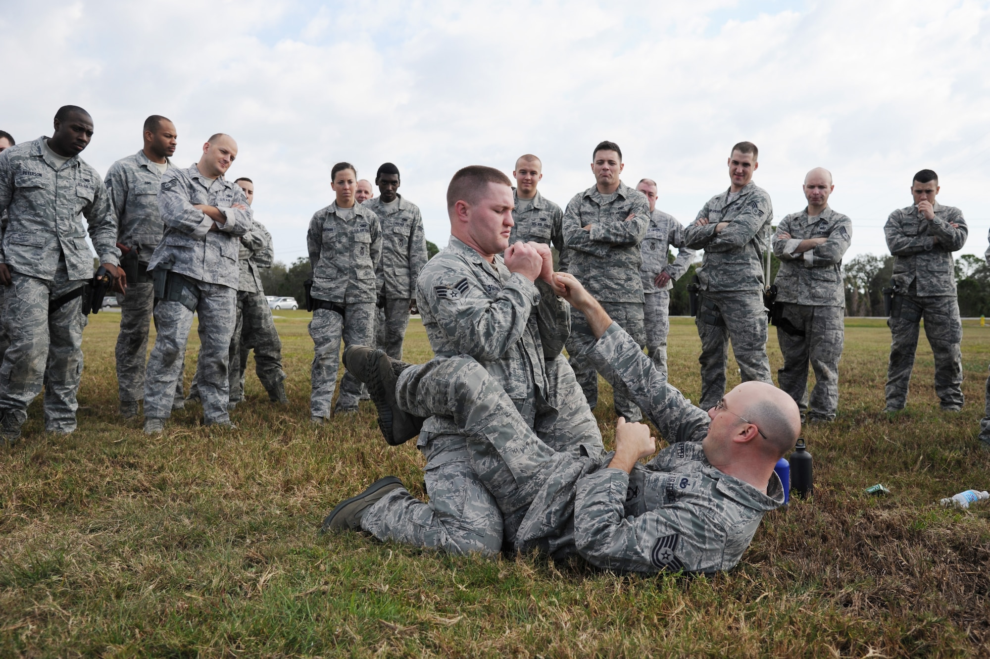 Senior Airman Randall Starnes, 927th Security Forces Squadron, defends himself against Tech. Sgt. Jason Knepper, 927th SFS, during a Security Forces combatives training session at MacDill Air Force Base, February 10, 2013.  The 927th Security Forces Squadron, a reserve unit based at MacDill AFB, is implementing a new combative training program designed to help security forces Airmen better protect themselves and others in case of a hand-to-hand struggle against an aggressor.  