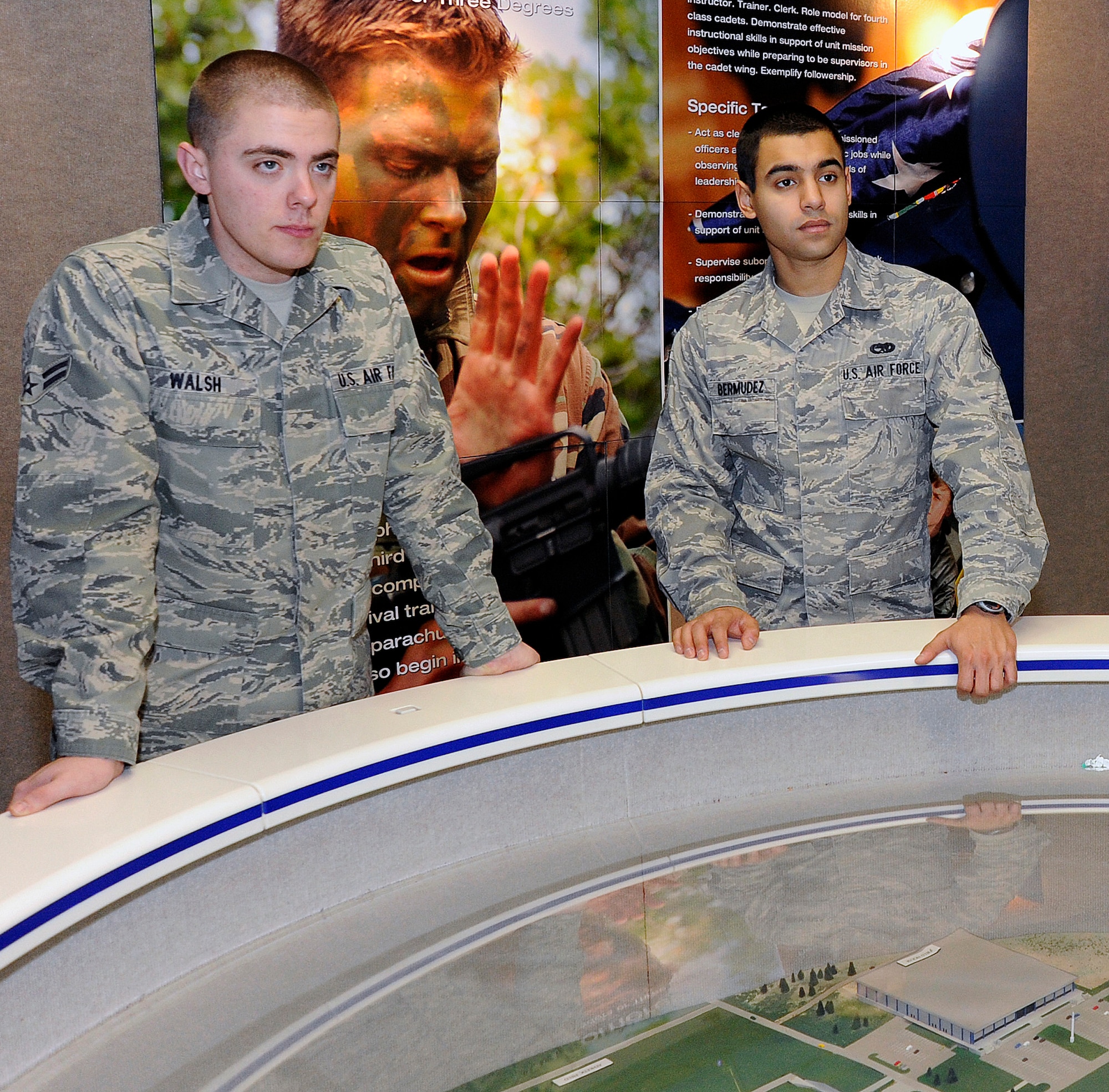Airmen 1st Class James Walsh and Daniel Bermudez tour the Air Force Academy Visitor Center Jan. 14, 2011, during a Leaders Encouraging Airmen Development orientation. Both were selected for entry into the Academy Preparatory School and into the Academy's Class of 2016. (U.S. Air Force photo/Mike Kaplan)