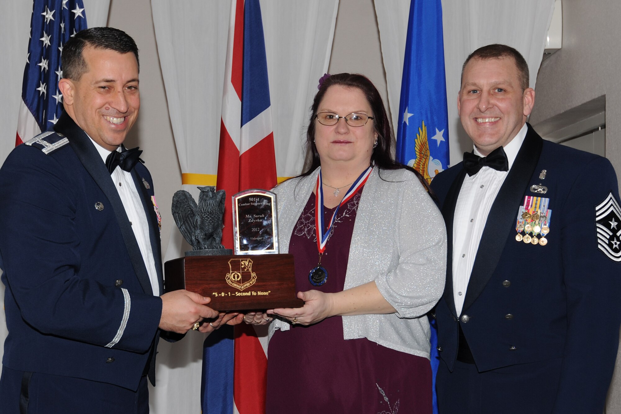 RAF CROUGHTON, United Kingdom - Sarah Zdyrko, 422nd Family Support Center, was named the 501st Combat Support Wing’s Civilian Volunteer of the Year during the 501st CSW Annual Awards at RAF Croughton Feb. 8. Zdyrko, from Bicester, United Kingdom, was an integral part of the planning committee for the World War II Fighter Pen Ceremony, helping preserve the Royal Air Force's heritage on the base. She is also a weekly youth leader for the Bicester Youth Program, helping keep youth off the streets and involved in local activities. (U.S. Air Force photo by Tech. Sgt. Chrissy Best)