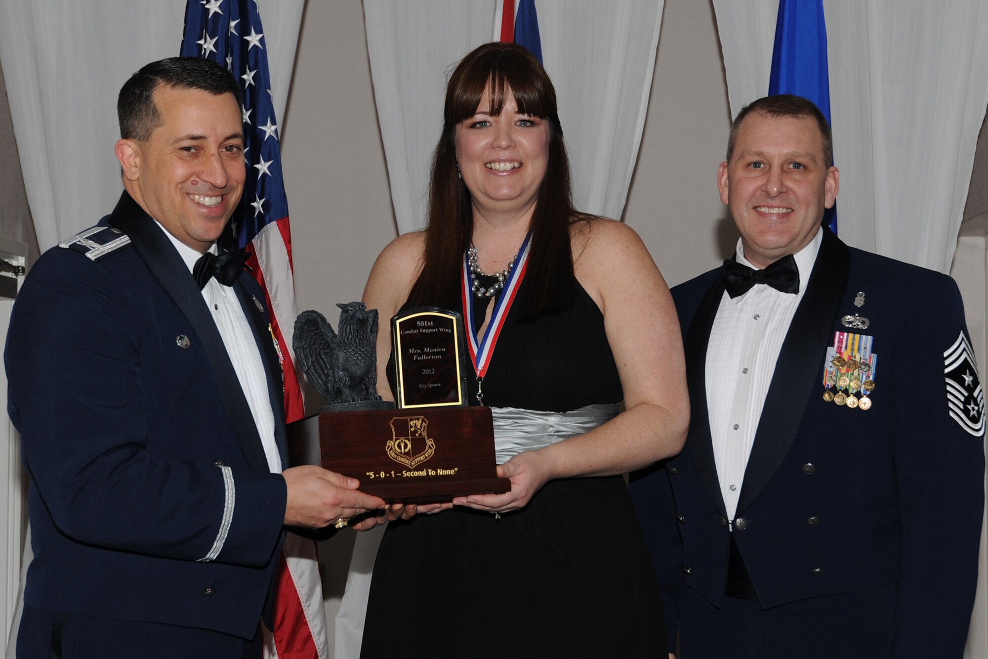 RAF CROUGHTON, United Kingdom - Monica Fullerton, 422nd Security Forces Squadron, was named the 501st Combat Support Wing’s Key Spouse of the Year during the 501st CSW Annual Awards at RAF Croughton Feb. 8. Fullerton initiated the Key Spouses Facebook page, where she reached 90 percent of the spouses. She also meets and greets new squadron spouses at billeting welcoming them to the squadron. (U.S. Air Force photo by Tech. Sgt. Chrissy Best)