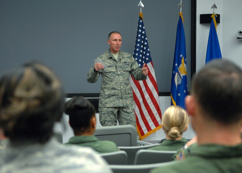 Maj. Gen. William Bender, U.S. Air Force Expeditionary Center commander, conducts an "All Call" with the 43rd Airlift Group's company grade officers during his visit to Pope Army Airfield, N.C. on Feb 8, 2013.  Maj. Gen. Bender along with his command chief, Chief Master Sgt. Jeffrey Cui, toured 43rd AG facilities, received mission briefings, conducted an "All Call" and served as the guest speaker for the group's annual awards banquet.