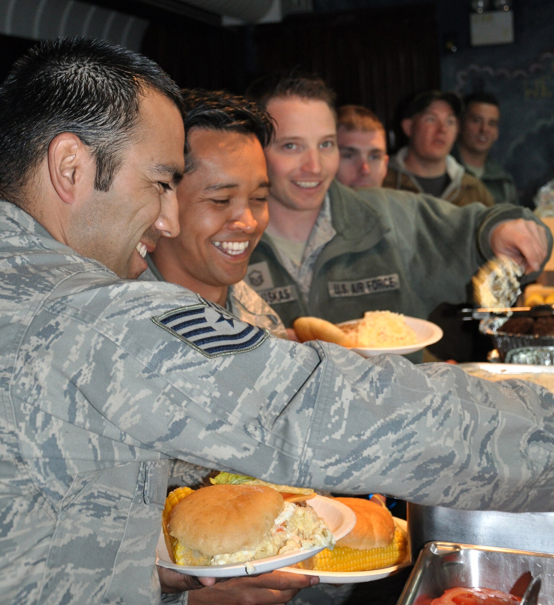 On Feb. 8, 2013, the same night as the Team Mildenhall Annual Awards at RAF Mildenhall, England, members of the 351st Expeditionary Air Refueling Squadron gathered for a monthly awards ceremony at a deployed location in southwest Europe. The 351st EARS deployed from the 100th Air Refueling Wing, RAF Mildenhall, to southwest Europe in January to support French operations in Mali. The monthly awards event consisted of a barbeque-style meal, certificates for winners and messages of appreciation from 351st leadership. (U.S. Air Force photo by Capt. Jason Smith)