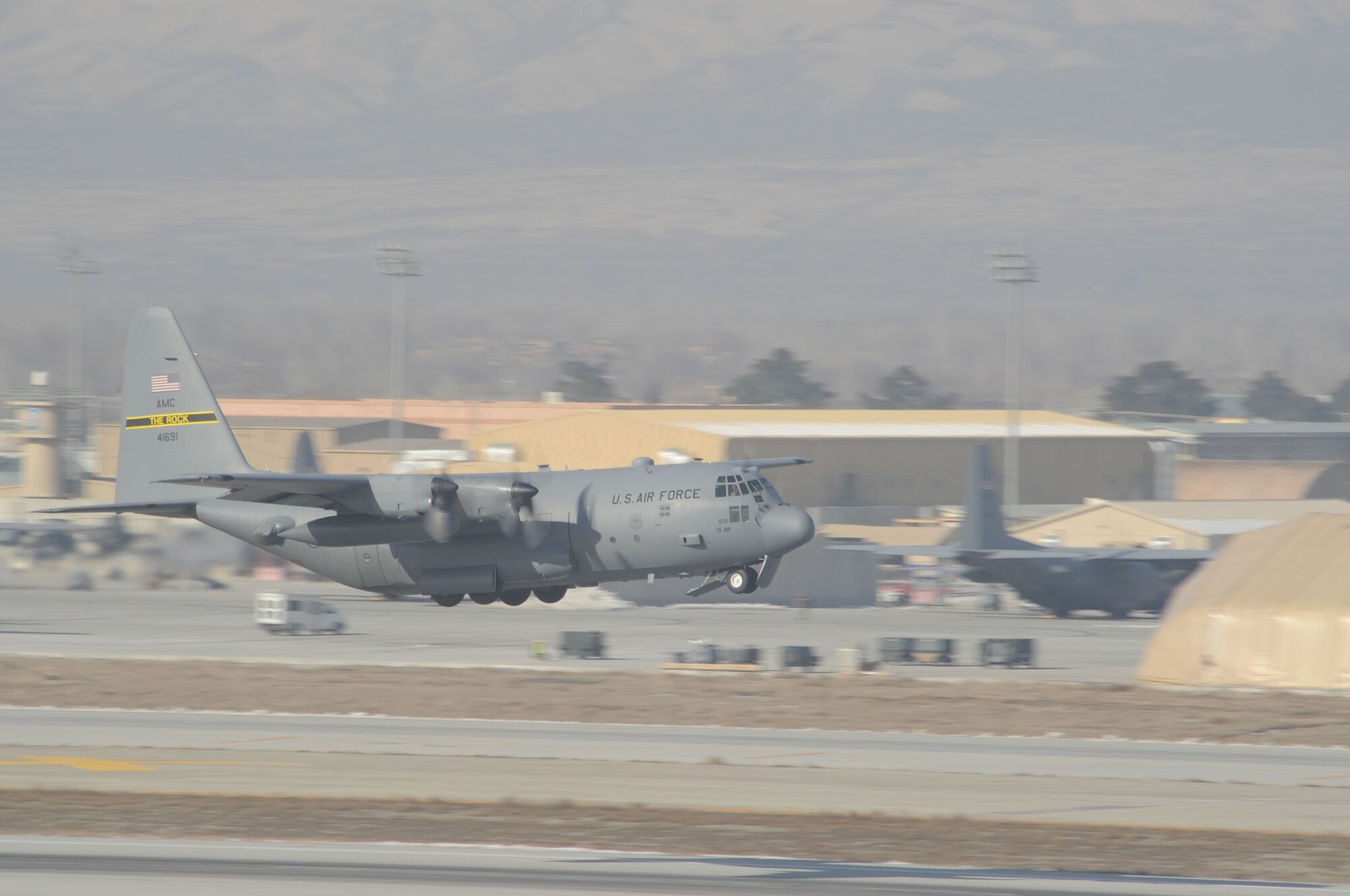 A C-130 Hercules takes off from Bagram Airfield, Afghanistan, Feb. 8, 2013. Bagram is the busiest single-runway airfield in the Department of Defense, with a takeoff or landing every 1.5 minutes. (U.S. Air Force photo/Staff Sgt. David Dobrydney)
