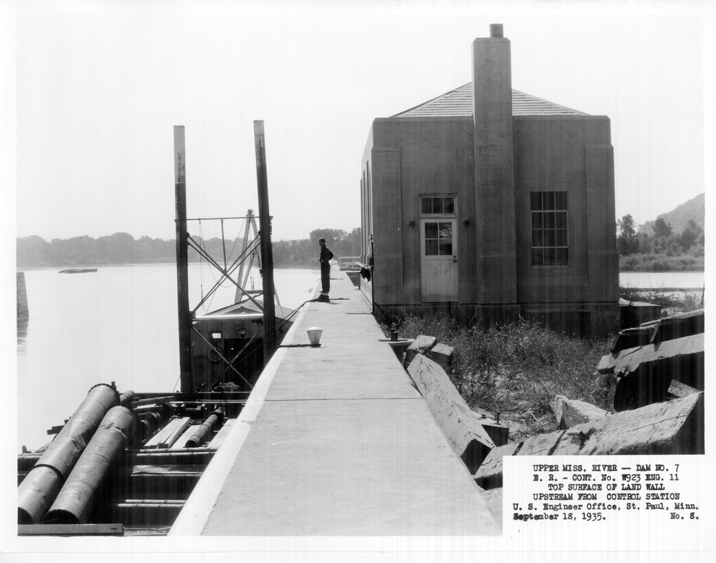 Construction of Lock and Dam 7 on the Upper Mississippi River in La Crescent, Minn., Sept. 18, 1935. Top surface of land wall upstream from control station.