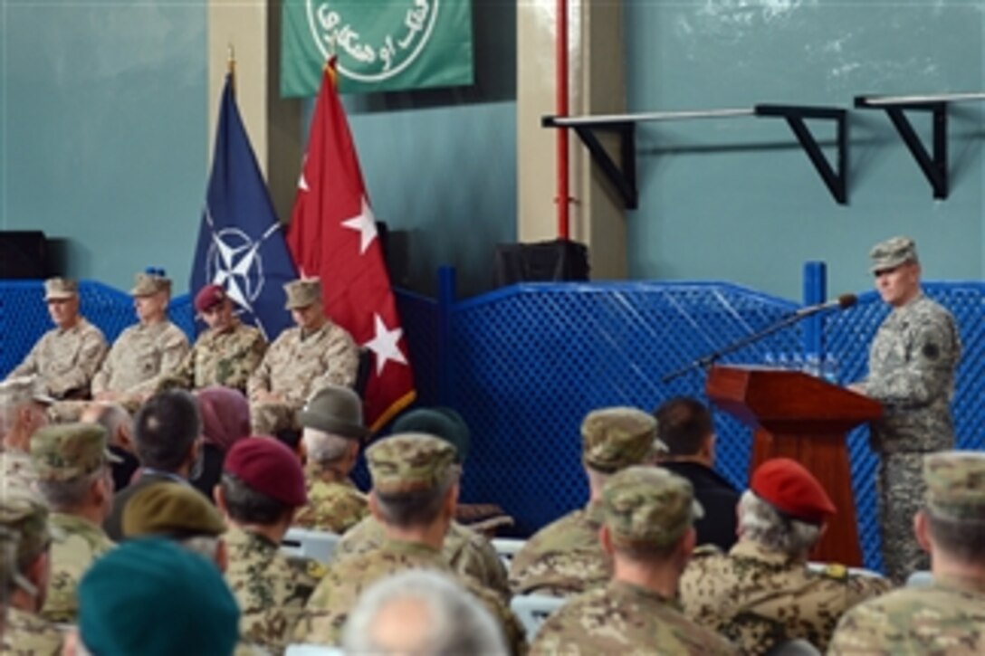 Chairman of the Joint Chiefs of Staff Gen. Martin E. Dempsey, right, delivers his remarks at the International Security Assistance Force change-of-command ceremony at ISAF headquarters in Kabul, Afghanistan, on Feb. 10, 2013.  U.S. Marine Corps Gen. Joseph Dunford assumed command from U.S. Marine Corps Gen. John Allen during the ceremony.  