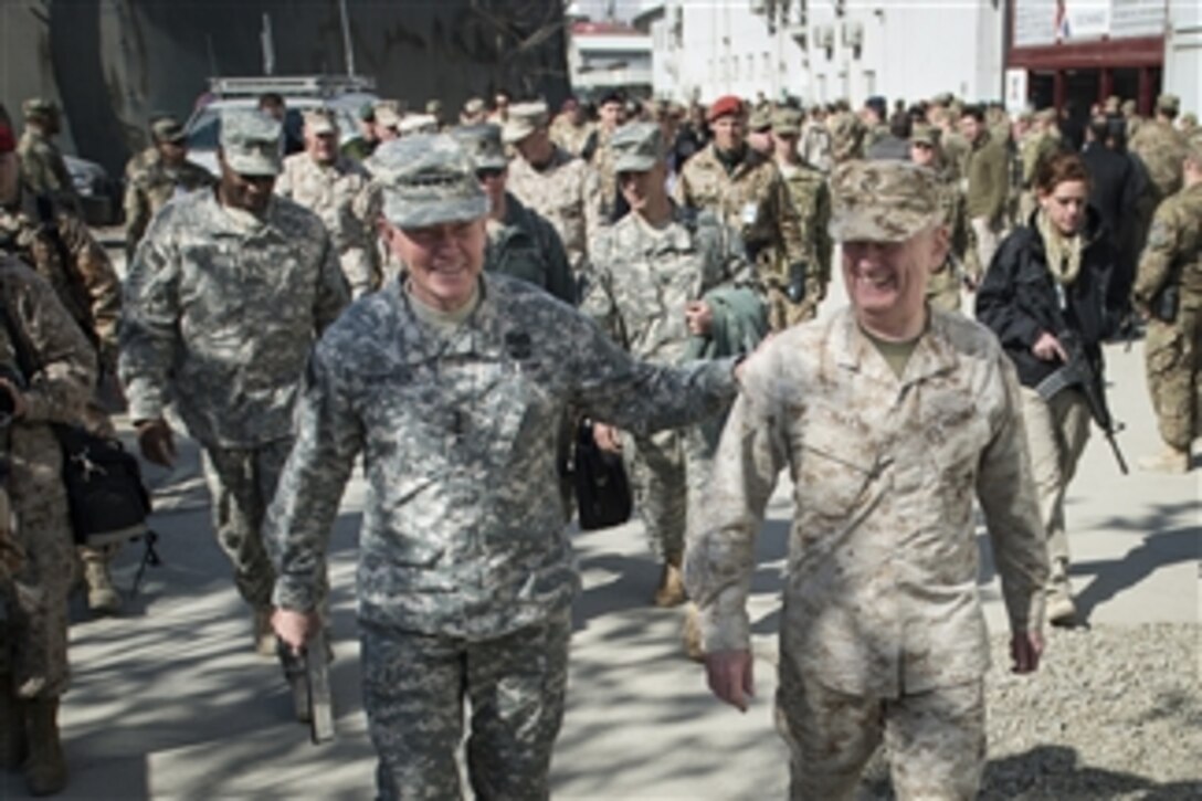 Chairman of the Joint Chiefs of Staff Gen. Martin E. Dempsey, left, and Commander, U.S. Central Command Gen. James Mattis, right, share a laugh as they leave the International Security Assistance Force change-of-command ceremony at ISAF headquarters in Kabul, Afghanistan, on Feb. 10, 2013.  Dempsey and Mattis watched as U.S. Marine Corps Gen. Joseph Dunford assumed command from U.S. Marine Corps Gen. John Allen during the ceremony.  
