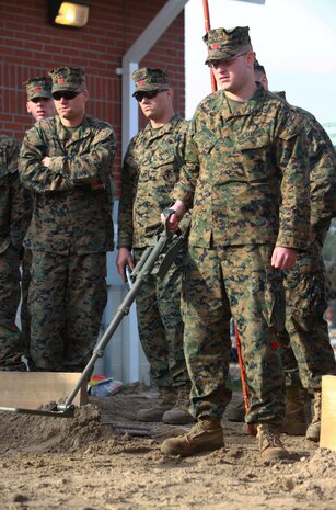 Cpl. Stephen J. Gaffney, a native of Cranberry Township, Pa., and landing support specialist with Combat Logistics Battalion 22, 2nd Marine Logistics Group, uses a metal detector to sweep a training field for simulated improvised explosive devices during an exercise aboard Camp Lejeune, N.C., Feb. 7, 2013. Gaffney used the metal detector to locate possible IEDs, which were placed throughout the area by explosive ordnance disposal technicians. 