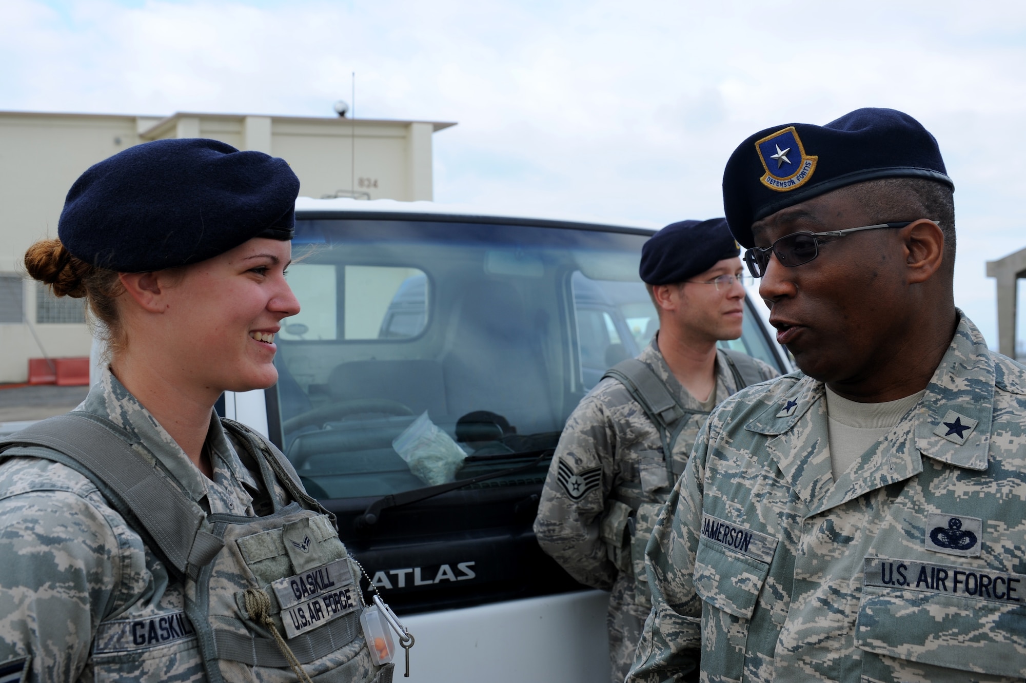 U.S. Air Force Brig. Gen. Allen Jamerson, Director of Security Forces, Deputy Chief of Staff for Logistics, Installations and Mission Support, Headquarters U.S. Air Force, Washington, D.C., speaks with Airman 1st Class Kayla Gaskill, 18th Security Forces Squadron response force member, on Kadena Air Base, Japan, Feb. 12, 2013. Jamerson visited Kadena as well as other Pacific security forces squadrons as part of a Pacific Air Forces tour. (U.S. Air Force photo/Airman 1st Class Hailey R. Davis)