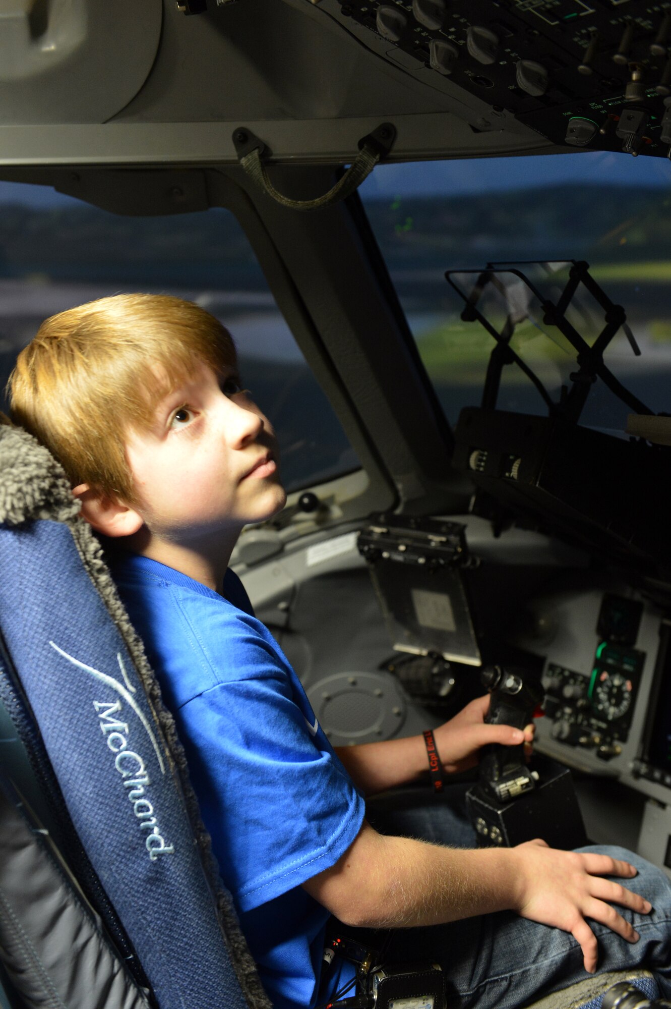 Carl Hess sits in cockpit of a C-17 flight simulator Feb. 11, 2013, at Joint Base Lewis-McChord, Wash. Carl spent the day at McChord Field living out his wish as part of the Make-a-Wish Foundation program. (U.S. Air Force photo/Staff Sgt. Jason Truskowski) 