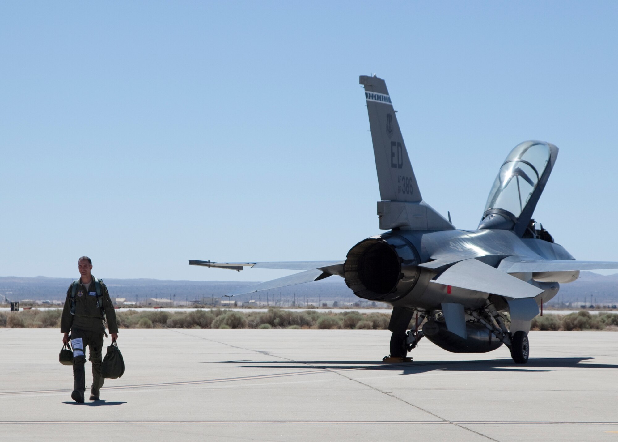 Lt. Col. Christopher Spinelli, 445th Flight Test Squadron commander, pilots F-16, Tail# 87-386 on his first flight as the Test Operations commander on June 27, 2012.  (U.S. Air Force Photo by Chris A. Neill)
