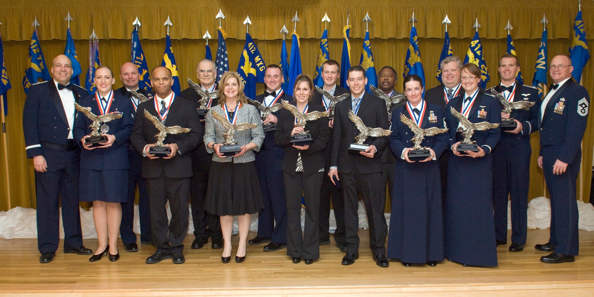 The 412th Test Wing 2012 annual award winners at Club Muroc Feb. 8. (U.S. Air Force photo by Edward Cannon)