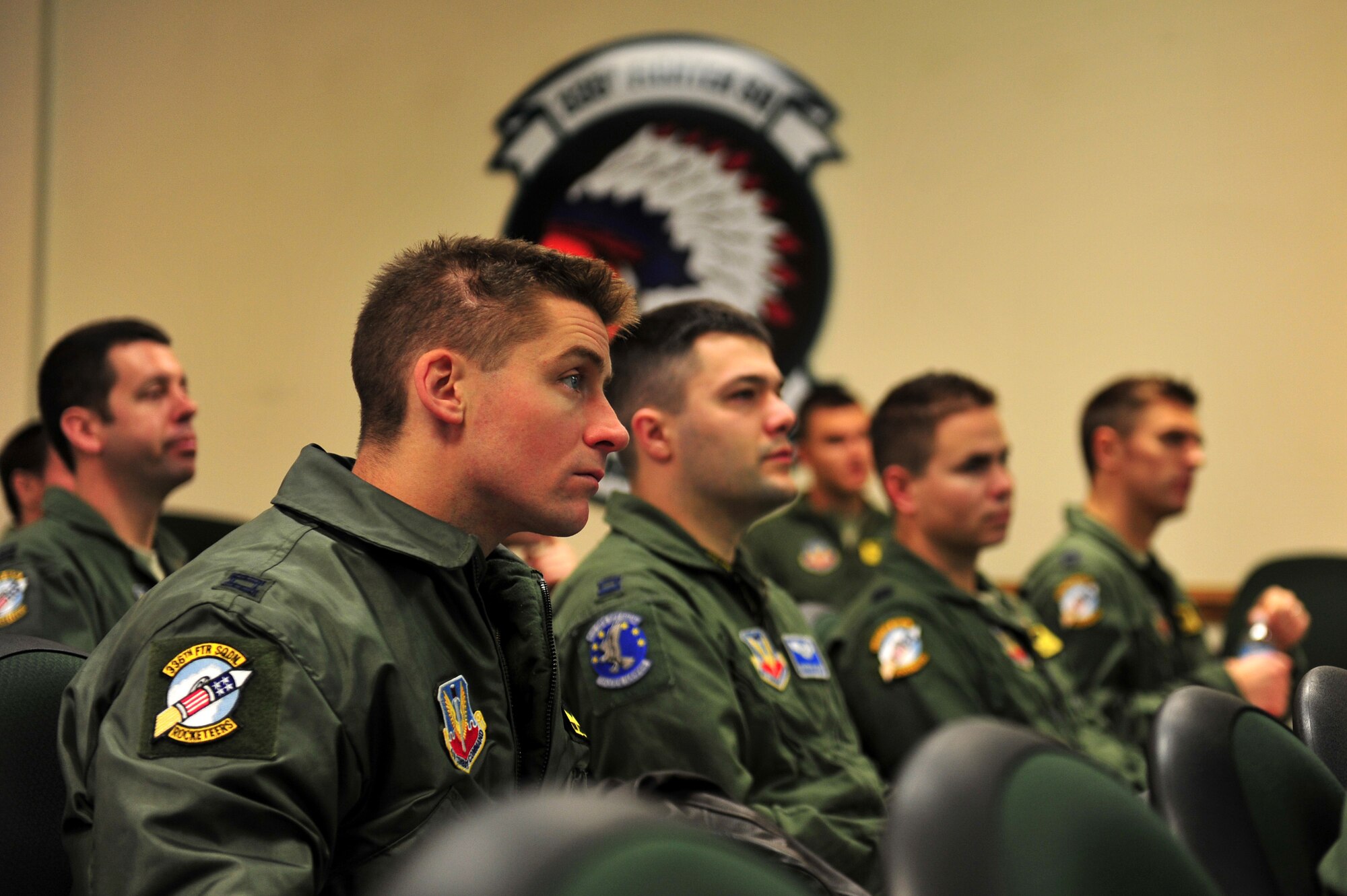 U.S. Air Force members assigned to the 4th Fighter Wing go over training objectives during a mass aircrew brief during exercise RAZOR TALON on Seymour Johnson Air Force Base, N.C., Feb. 7, 2013. RAZOR TALON is a monthly, large force exercise and joint-unit training opportunity to employ cutting edge operational concepts on the Atlantic Coast. (U.S. Air Force photo by Staff Sgt. Andy M. Kin)