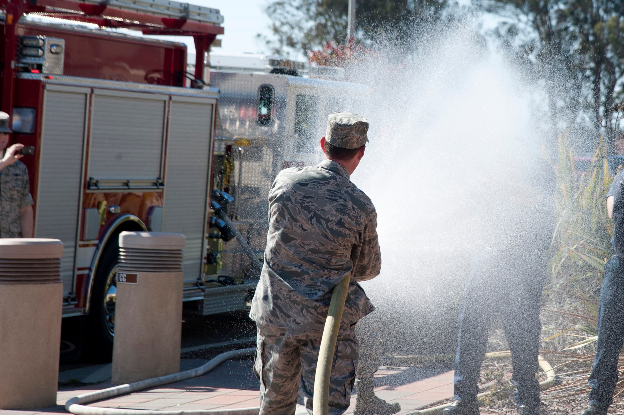 VANDENBERG AIR FORCE BASE, Calif. - Following the launch of a Atlas V
rocket, the 30th Space Wing commander received the service's traditional
"hose down" celebration at the Western Range Operations Control Center here
Monday, Feb. 11, 2013. Col. Nina Armagno, 30th SW commander, directed her
final launch as the commander of the space wing here during the launch of a
United Launch Alliance Atlas V rocket from Space Launch Complex-3. (U.S. Air
Force photo/Senior Airman Lael Huss)
