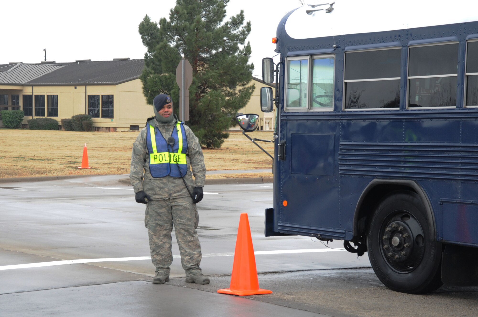A member of the 82nd Security Forces Squadron looks for violators using unauthorized cell phones along Ave. D on Sheppard Air Force Base, Texas, on Feb. 12, 2013.  The 82nd SFS launched a traffic enforcement campaign aimed at catching distracted drivers in the act on the base. (U.S. Air Force photo/Dan Hawkins)