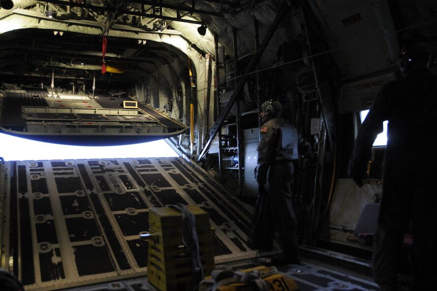 Air Force Tech. Sgt. Stanley Hain, loadmaster with the 193rd Special Operations Wing opens the ramp on a C-130J aircraft, Feb. 12, 2013 at Cambria County Airport, Johnstown, Pa. Members of the 193rd SOW flew to Johnstown to pick up Soldiers from the 252nd Engineer Company and bring them to Bradley International Airport, Windsor Locks, Conn. Soldiers and Airmen from the Pennsylvania National Guard will assist with closed roadways, stranded motorists, transportation of health care professionals to hospitals, and assist communities by performing area welfare checks of residents who may be cut off from power, food, or medical care due to Winter Storm Nemo.  (U.S. Air Force Photo by Tech. Sgt Culeen Shaffer/Released)