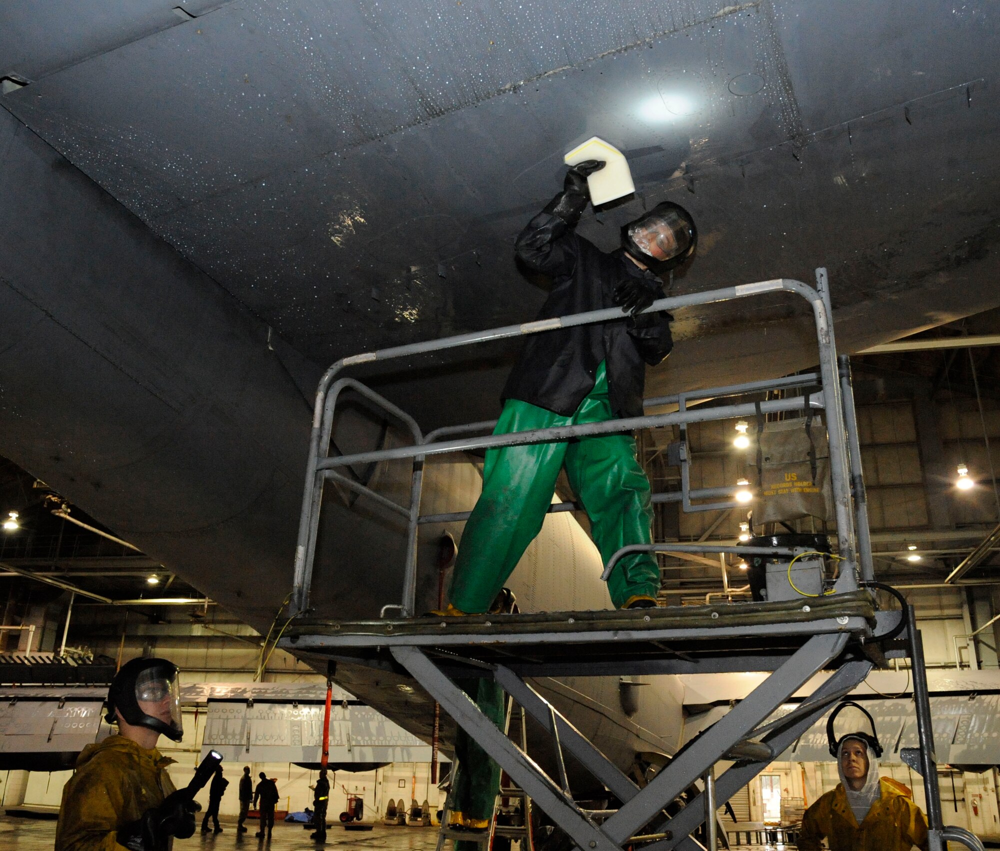 Airman 1st Class Blake Nickells, 2nd Aircraft Maintenance Squadron, cleans a B-52H Stratofortress prior to a corrosion inspection on Barksdale Air Force Base, La., Feb. 12. Corrosion may cause many problems for an aircraft. While components and parts can be replaced and upgraded, if the airframe itself is damaged the jet can be rendered unserviceable. (U.S. Air Force photo/Airman 1st Class Andrew Moua)