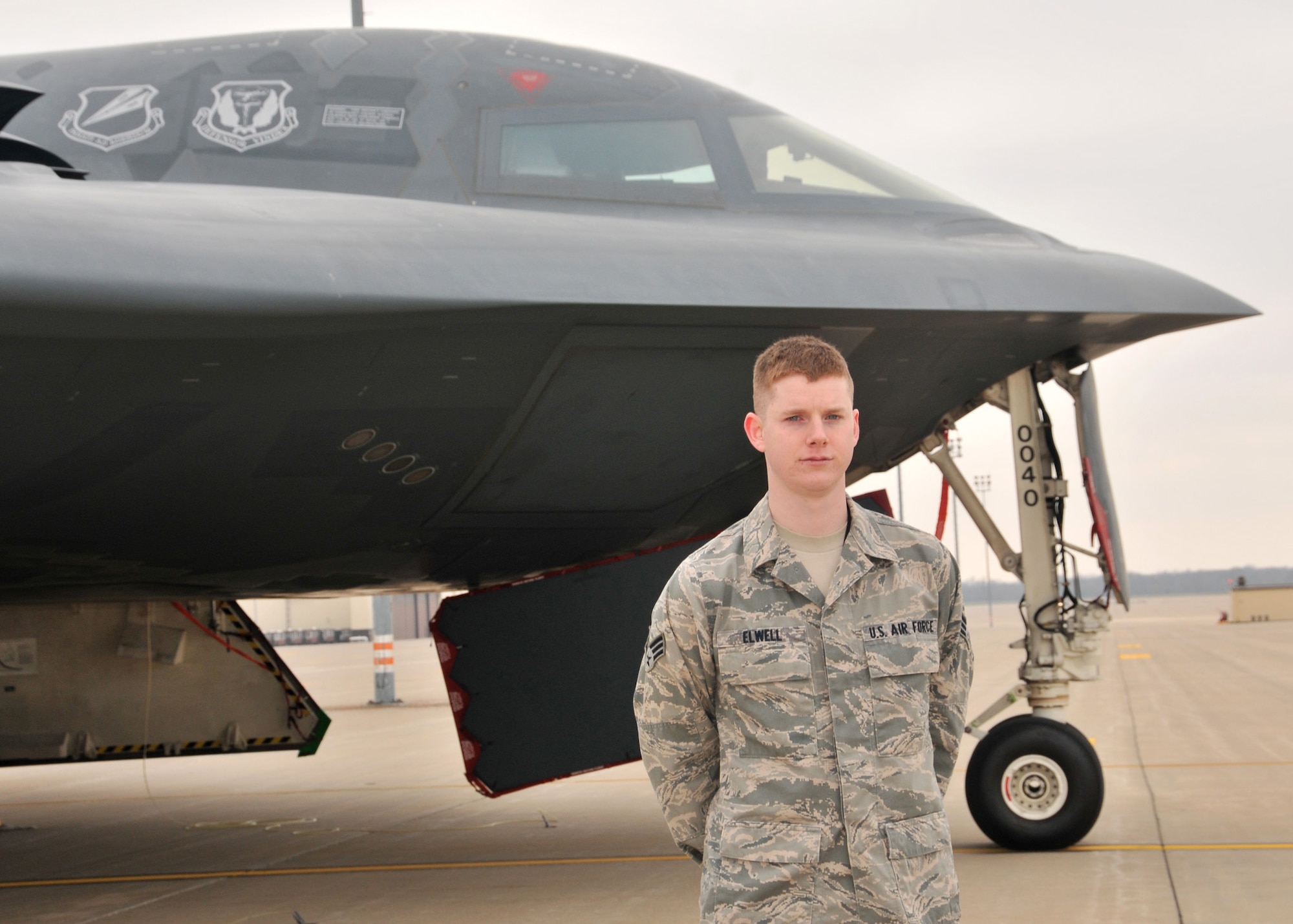 Senior Airman Joseph  Elwell, 131st Bomb Wing, is the 2012 Airman of the Year for the Missouri Air National Guard. Elwell, pictured here with a B-2 Stealth Spirit at Whiteman Air Force Base, is attending Central Missouri State University where he is studying computer information systems. (National Guard photo by Senior Master Sgt. Mary-Dale Amison)