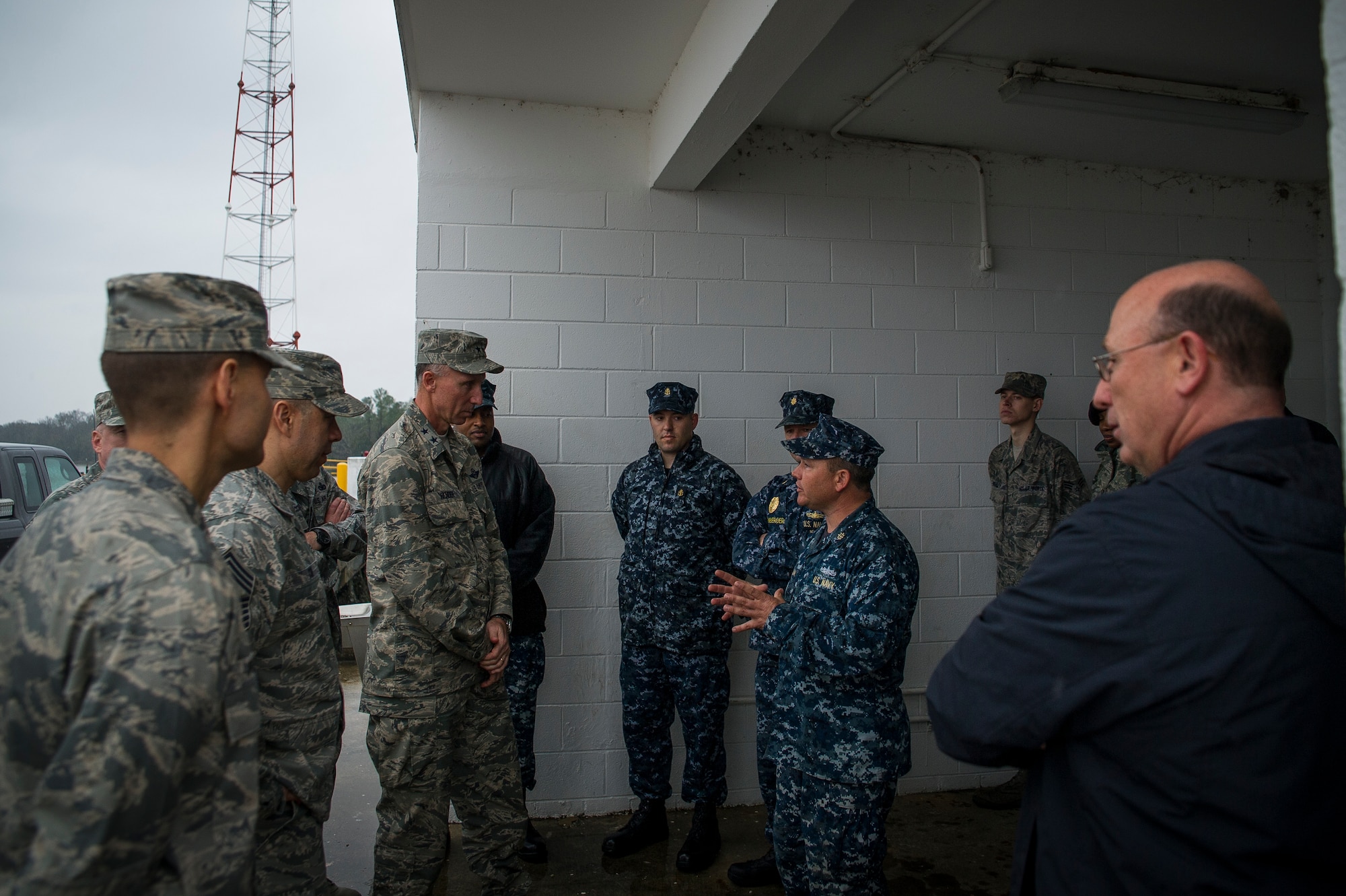 Chief Warrant Officer John Wilson, 628th Logistics Readiness Squadron port operations officer, briefs Maj. Gen. William J. Bender, U.S. Air Force Expeditionary Center commander, Joint Base McGuire-Dix-Lakehurst, N.J., during a visit Feb. 7, 2013, at Joint Base Charleston - Weapons Station, S.C. General Bender was visiting JB Charleston as one of several site visits to see the missions and units aligned under the Expeditionary Center administratively. The EC provides administrative control for six wings and two groups within Air Mobility Command, to include the 628th Air Base Wing at Joint Base Charleston, S.C. (U.S. Air Force photo/ Senior Airman George Goslin)