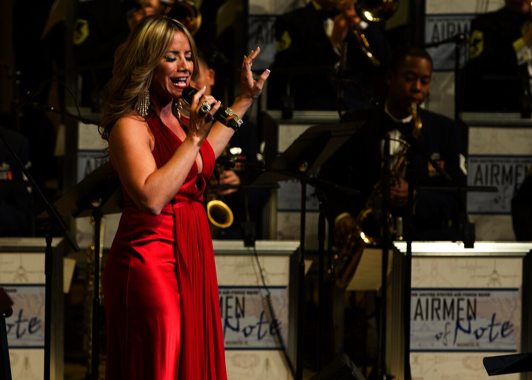 Melina Leon, Latin singer and actress, performs with components of the U.S. Air Force Band during a Guest Artist Series concert Feb. 10, 2013 in Washington, D.C. This was the first of three concerts in the 2013 Guest Artist Concert series, which will feature guest artists “The Rogues,” a Scotish/Celtic rock band, on Feb. 24, and country music sensation Lee Greenwood on Mar. 10. (U.S. Air Force photo/Senior Airman Bahja Joi Jones)