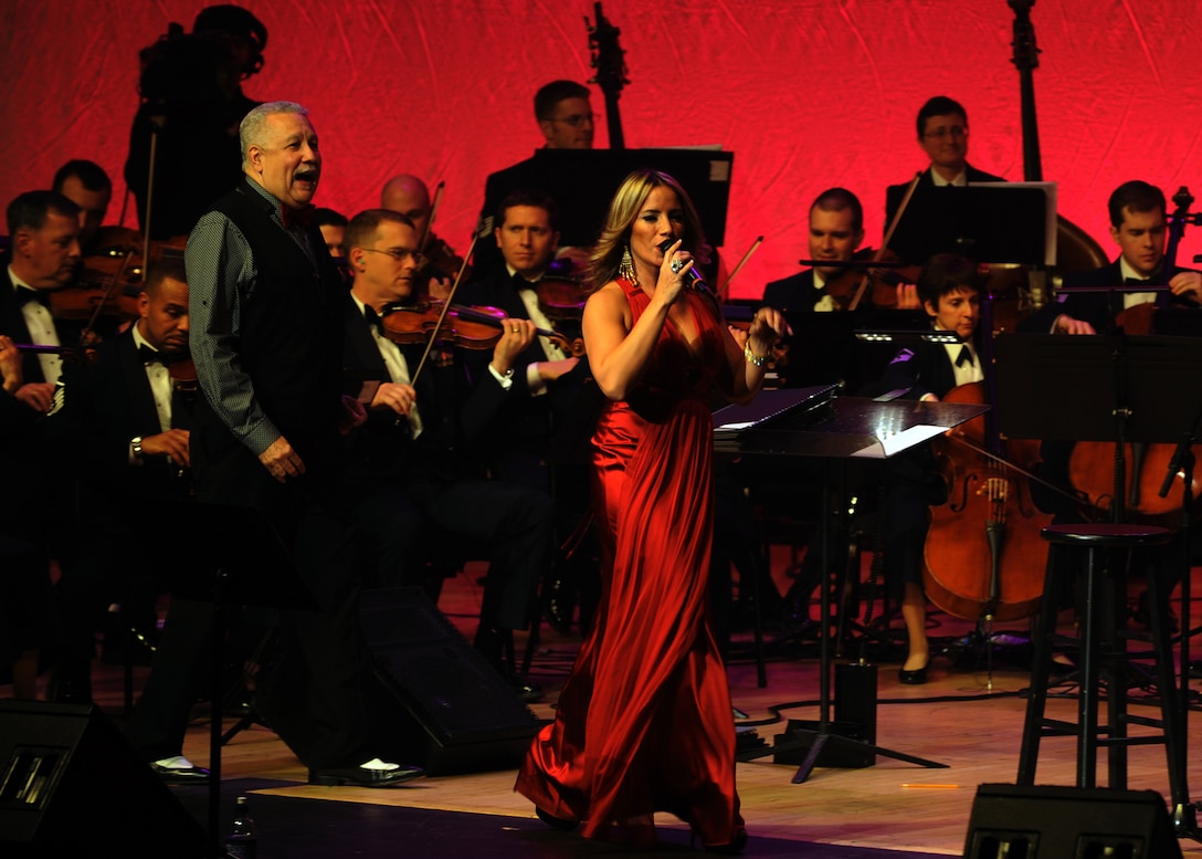 Guest artists Melina Leon, Latin vocalist, and Paquito D’Rivera, Latin Jazz musician, return to the stage for an encore during the Guest Artist Series concert Feb. 10, 2013 in Washington, D.C. This was the first of three concerts in the 2013 Guest Artist Concert series, which will feature guest artists “The Rogues,” a Scotish/Celtic rock band, on Feb. 24, and country music sensation Lee Greenwood on Mar. 10. (U.S. Air Force photo/Senior Airman Bahja Joi Jones) 