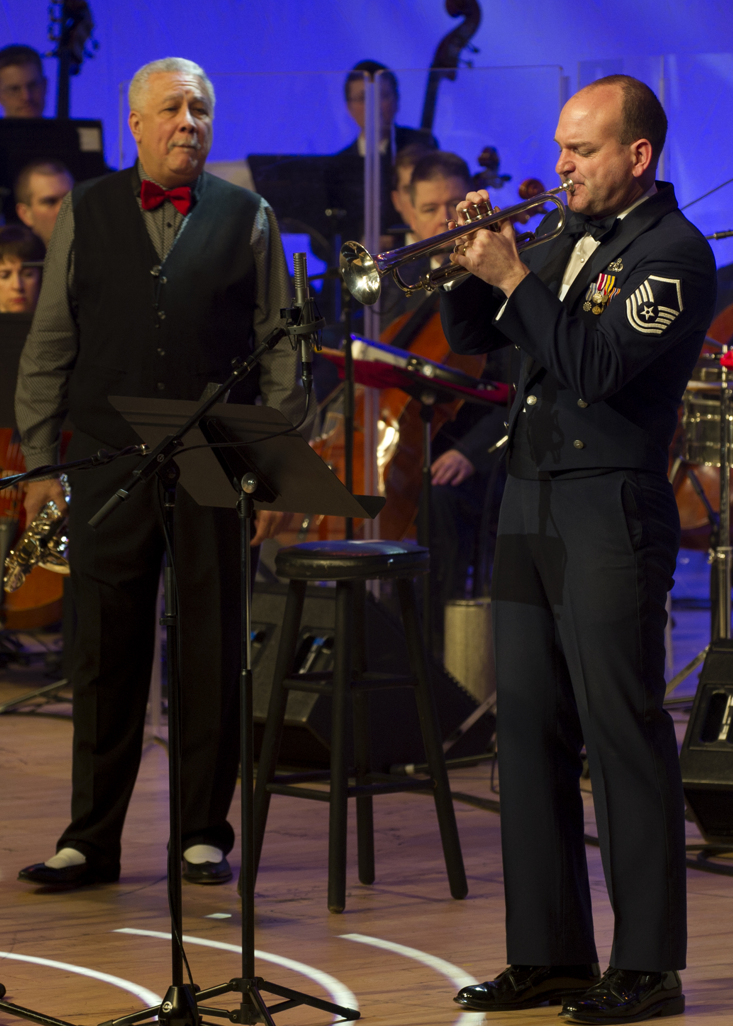 Master Sgt. Rich Sigler, Airmen of Note trumpeter, performs a solo alongside Paquito D’Rivera, 11-time Grammy Award winner and Latin Jazz musician, during a Guest Artist Series concert Feb. 10, 2013 in Washington, D.C. This was the first of three concerts in the 2013 Guest Artist Concert series, which will feature guest artists “The Rogues,” a Scotish/Celtic rock band, on Feb. 24, and country music sensation Lee Greenwood on Mar. 10. (U.S. Air Force photo/Senior Airman Bahja Joi Jones) 