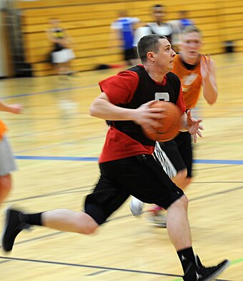 Airman 1st Class Kyle Gregory, 28th Civil Engineer Squadron Fire and Emergency Services firefighter, drives to the hoop during the 2013 Intramural Basketball League tournament in the Bellamy Fitness Center at Ellsworth Air Force Base, S.D., Feb. 5, 2013. The league, comprised of 10 teams, showcased some of Ellsworth’s finest basketball players battling it out on the hardwood. (U.S. Air Force photo by Airman 1st Class Hrair H. Palyan/Released)
