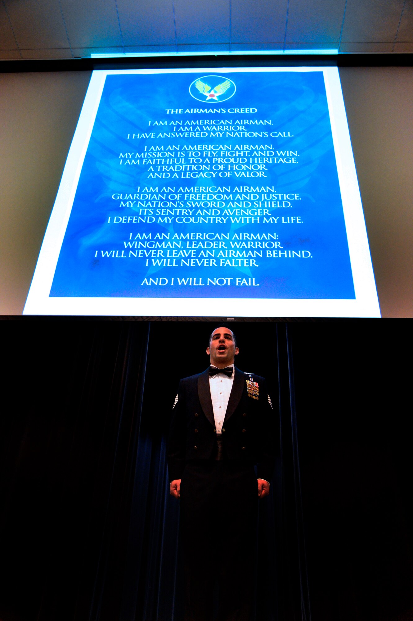 Staff Ssgt Kevin Sicalari recites the Airmans Creed during the 2012 436 AW  Annual Awards Ceremony, held Feb 8, 2013 at Dover Downs Hotel Casino Dover Del. U.S. Air Force photo/David S. Tucker