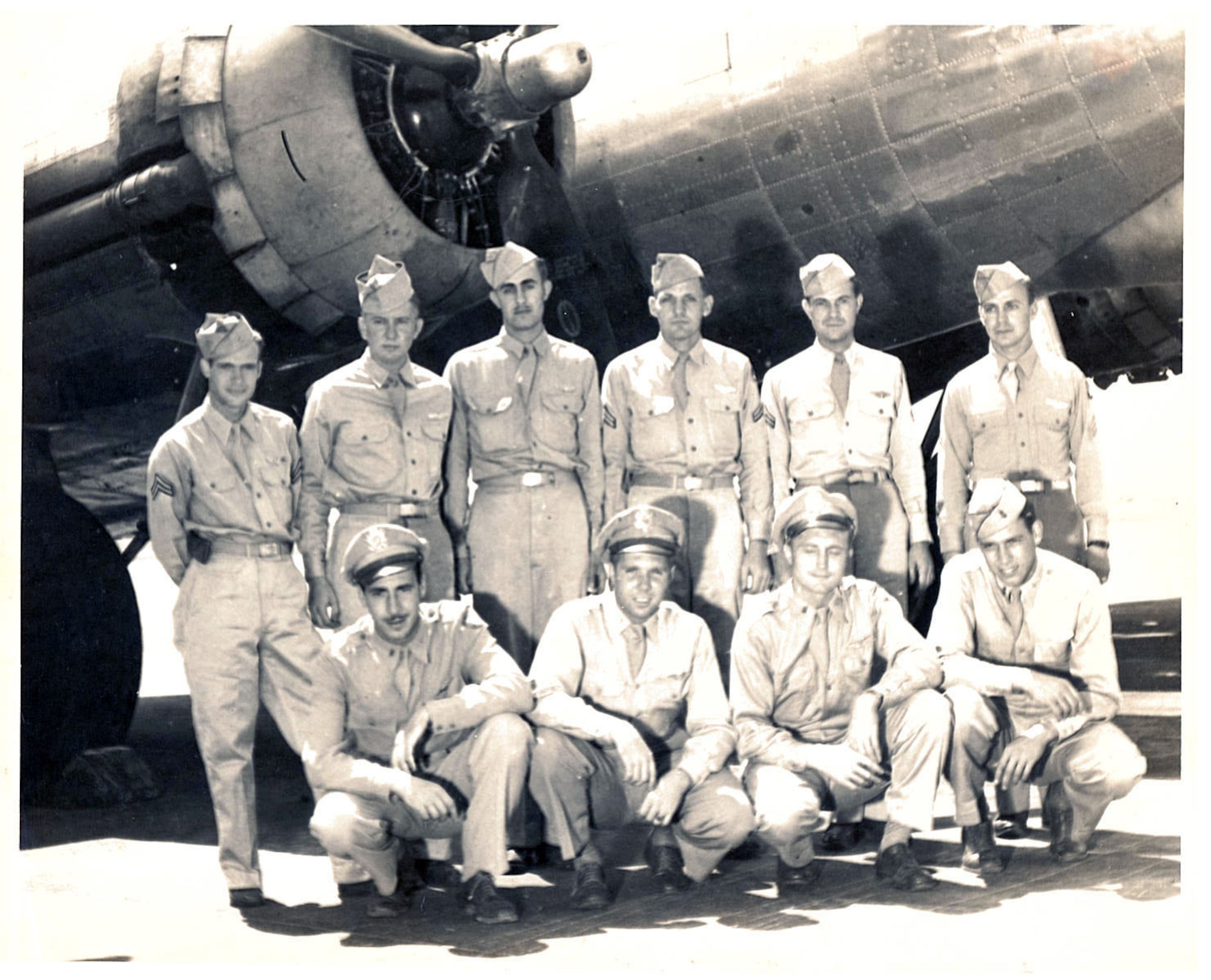 Adrian Marlin, back row, second from the left, poses with his aircrew in a photo taken during World War II.  Marlin served as a tail gunner on a B-17 Flying Fortress during the war.  He and his aircrew survived a crash landing in 1944.  Marlin was recognized and honored for his service by the Air Force Reserve 931st Air Refueling Group, McConnell Air Force Base, Kan., during the unit's annual award banquet, Feb. 9, 2013.  (Courtesy photo)