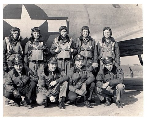 Adrian Marlin, back row, center, poses with his aircrew in a photo taken during World War II.  Marlin served as a tail gunner on a B-17 Flying Fortress during the war.  He and his aircrew survived a crash landing in 1944.  Marlin was recognized and honored for his service by the Air Force Reserve 931st Air Refueling Group, McConnell Air Force Base, Kan., during the unit's annual award banquet, Feb. 9, 2013.  (Courtesy photo)