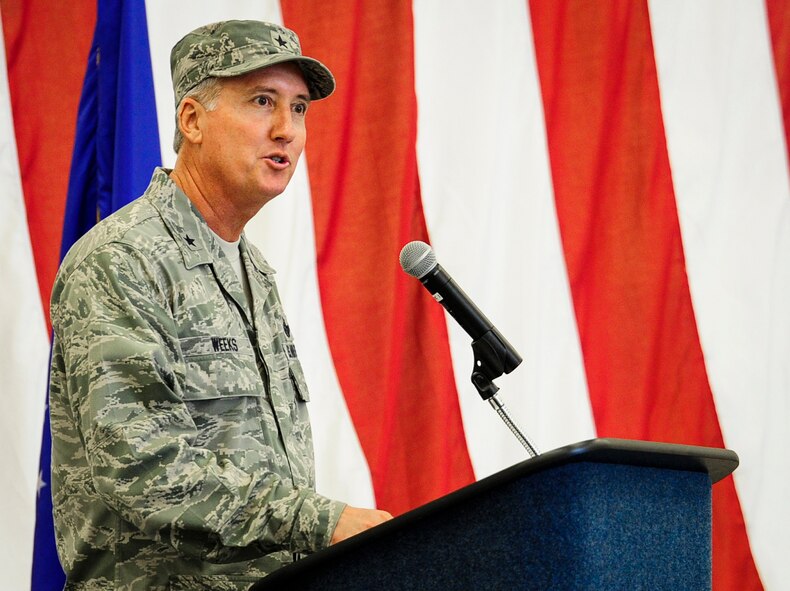Former 919th Special Operations Wing commander, Brig. Gen. Jon Weeks speaks to the crowd after accepting command of the Air Force Special Operations Air Warfare Center at an activation ceremony at Duke Field, Fla., Feb. 11.  The new center is Weeks’ third special operations command.  The AFSOAWC will combine the efforts of units across AFSOC that work with doctrine development, education, training and execution of the command’s irregular warfare capabilities.  The center will bring together more than 500 active-duty and reserve Airmen through total force integration.  (U.S. Air Force photo/Airman 1st Class Christopher Calloway)