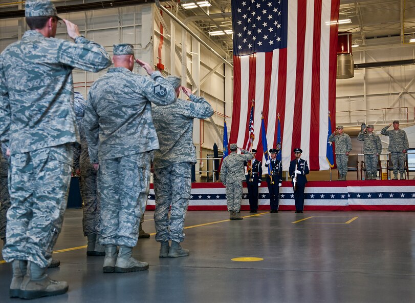 Air Force Special Operations Command Airmen and leadership salute the flag during the National Anthem at the Air Force Special Operations Air Warfare Center activation ceremony at Duke Field, Fla., Feb. 11.  Former 919th Special Operations Wing commander, Brig. Gen. Jon Weeks assumed command of the center.  The AFSOAWC will combine the efforts of units across AFSOC that work with doctrine development, education, training and execution of the command’s irregular warfare capabilities. The center will bring together more than 500 active-duty and reserve Airmen through total force integration.   (U.S. Air Force photo/Tech. Sgt. Samuel King Jr.)
