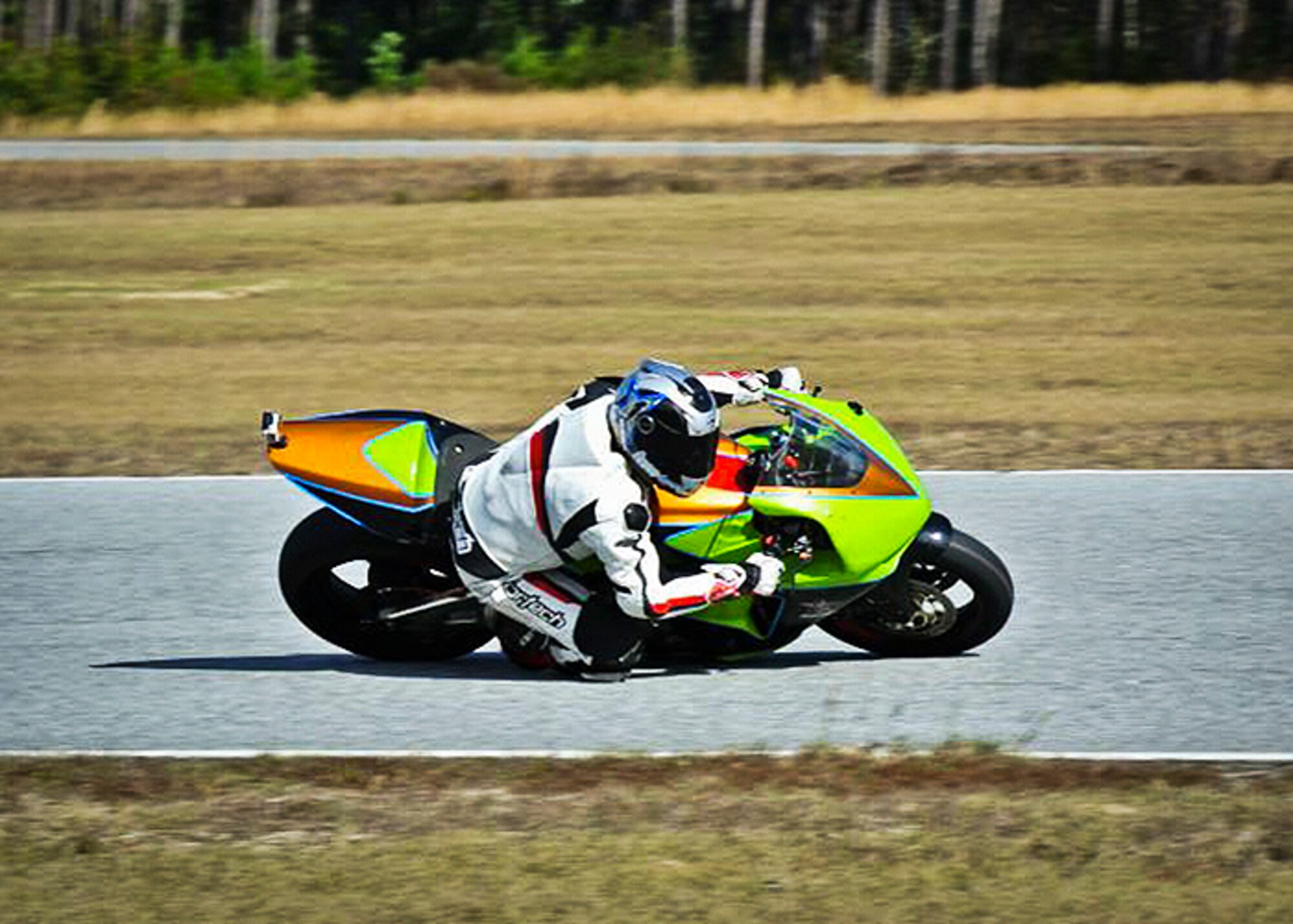Staff Sgt. Stephen Incledon, of the 96th Aircraft Maintenance Squadron, hangs on through a turn during a recent practice session on his racing motorcycle.  Incledon begins a new season in the amateur motorcycle racing circuit Feb. 17.  A top three finish in the season standings earns him an expert license.  (Courtesy photo/Caitlin Incledon)