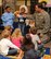 Capt. Brett Ryan, 2nd Dental Squadron dentist, demonstrates the proper way to brush your teeth to a class at the Child Development Center West as part of National Children's Dental Health Month on Barksdale Air Force Base, La., Feb. 12. Ryan, along with other Barksdale dentists, emphasized how important it is to maintain proper oral hygiene. (U.S. Air Force photo/ Senior Airman Sean Martin)