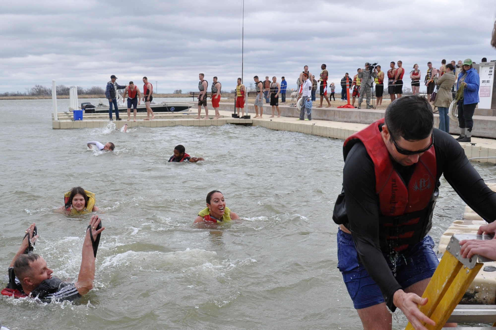 SAN ANGELO, Texas – Participants swim in the 46-degree water of Lake Nasworthy during the 2013 Goodfellow Outdoor Recreation Camp Polar Bear Plunge, Feb. 9. More than 80 participants attended this year’s plunge. (U.S. Air Force photo/ Staff Sgt. Robert Smith)