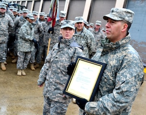 U.S. Army Sgt. Jesus Rivera, assigned to the 382nd Transportation Theater Opening Element, Special Troops Battalion, 7th Sustainment Brigade, was recognized Feb. 11 for his outstanding effort supporting the Office of the Deputy Chief of Staff, G-2 section, in November 2012. He was presented with a star note written by Defense Intelligence Senior Executive Officer Thomas F. Greco and presented by Col. Jennifer Reinkober, commander, 7th Sus. Bde. A star note is a congratulatory letter written by a general officer, or civilian equivalent, to a Service member thanking them for going above and beyond the call of duty. (U.S. Army photo by Sgt. Edwin J. Rodriguez/Released)